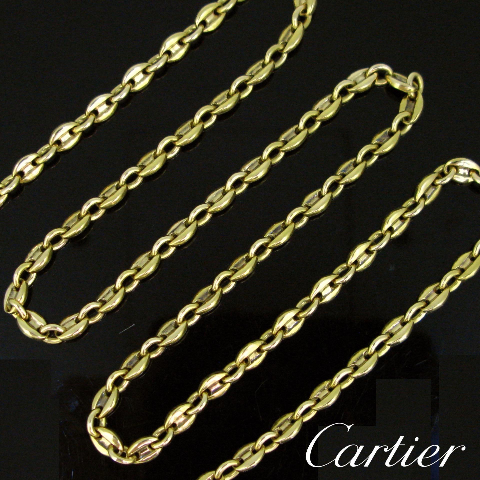 Weight:	33.6gr


Metal:		18kt yellow Gold

Condition:	Very Good

Signature:	Cartier nº166865

Comments:		This bracelet is made in 18kt yellow gold. It is the Grain de Café (coffee bean) link chain necklace. It is signed and numbered. It is in very
