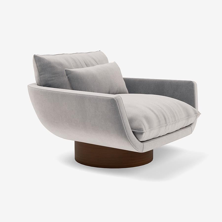 This Rua Ipanema lounge chair by Yabu Pushelberg is upholstered in Bagdat Caddesi, silky, soft pile mohair. Bagdat Caddesi comes in 7 colorways from Italy with a composition of 100% mohair, a weight of 680g/m and a Martindale of 35,000