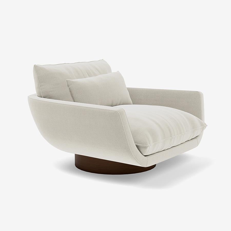 This Rua Ipanema lounge chair by Yabu Pushelberg is upholstered in Geneva Avenue textured wool. Geneva Avenue comes in 5 colorways from Germany with a composition of 96% virgin wool and 4% polyamide, a weight of 1010g/m and a Martindale of 90,000