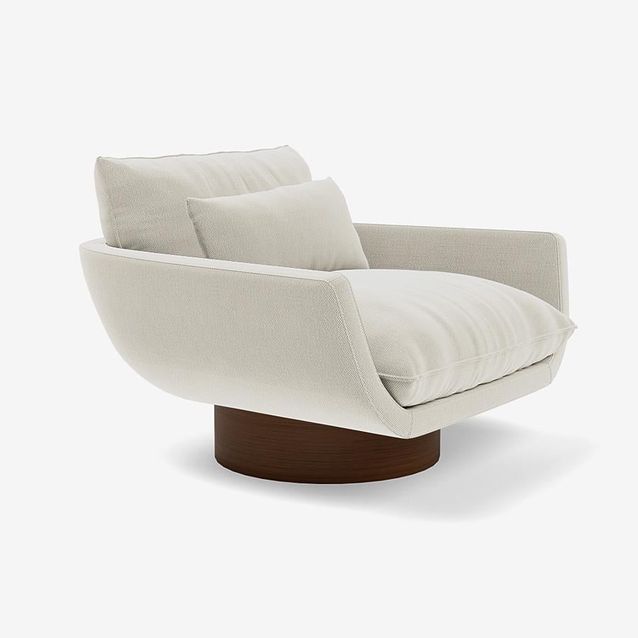 This Rua Ipanema lounge chair by Yabu Pushelberg is upholstered in Geneva Avenue textured wool. Geneva Avenue comes in 5 colorways from Germany with a composition of 96% Virgin Wool and 4% Polyamide, a weight of 1010g/m and a Martindale of 90,000