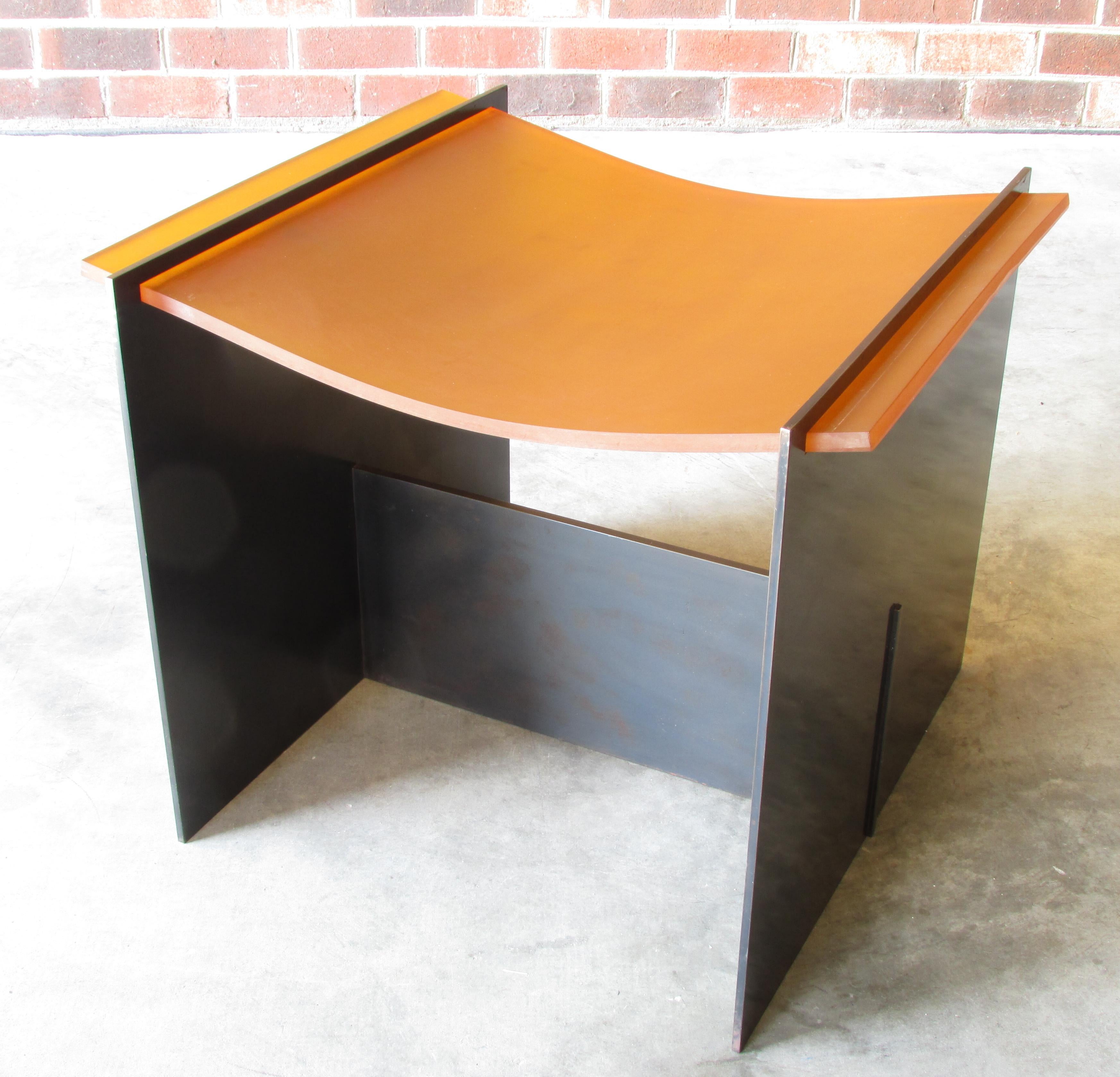 Minimalist simple style stool or seat made of blackened steel and suspended rubber seat by David Gulasso.