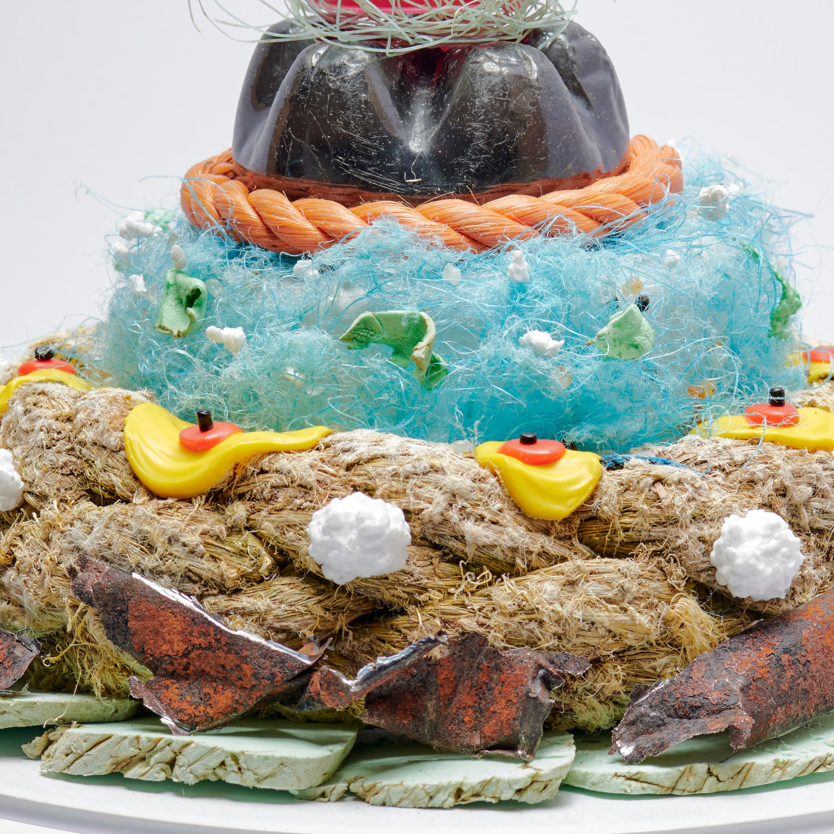 Photograph on C print.
The Cake is made from rest over waste ingredients found on the shore in the harbor in Rotterdam. Rubdish is a conceptual visualization of waste finding it’sway back onto your plate. It is the transformation of rubbish into an