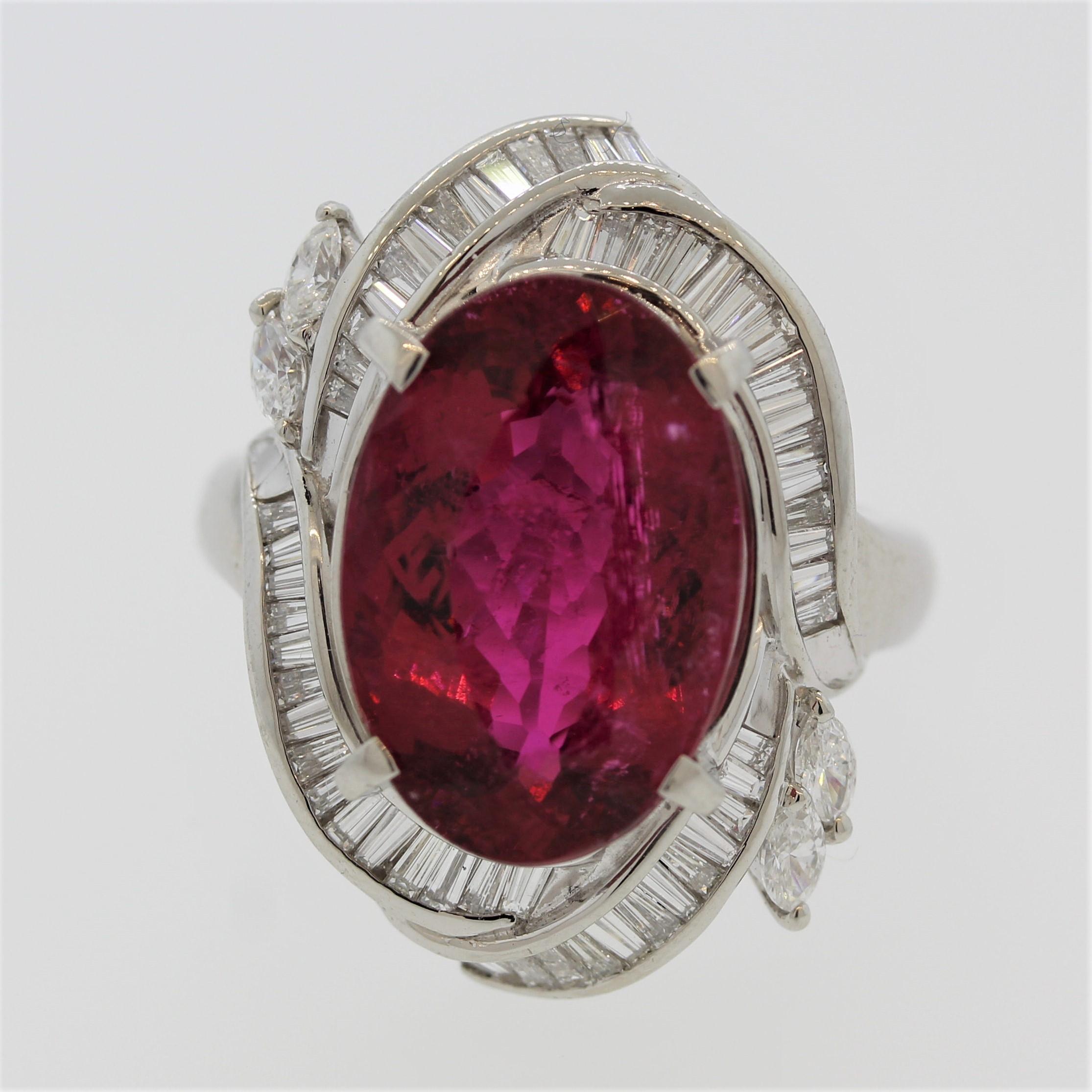 A superb example of the fine red variety of tourmaline called rubelite. This example shaped as an oval weighs 9.17 carats and has a vivid red color that rivals the finest rubies, giving the stone the name “ruby like” aka rubelite. It is accented by