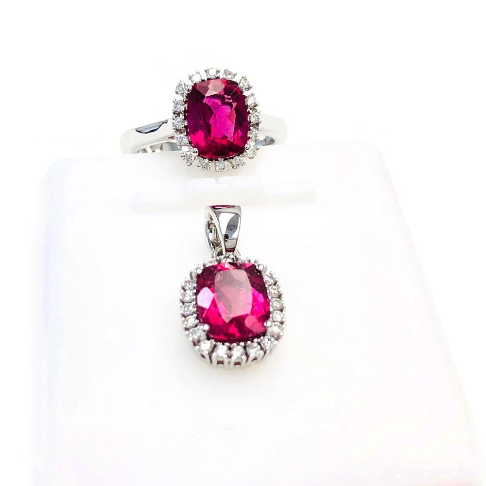 Cushion Shaped Rubelite with Diamond 14K White Gold Ring and Pendant 2 Piece Set

RING SPECIFICATIONS:

Center Stone Details: 
Stone: Rubelite
Shape: Rectangular Cushion-cut
Size: 9mm x 7mm
Weight: 1.94 carat

Diamond Details:
Shape: Round Brilliant