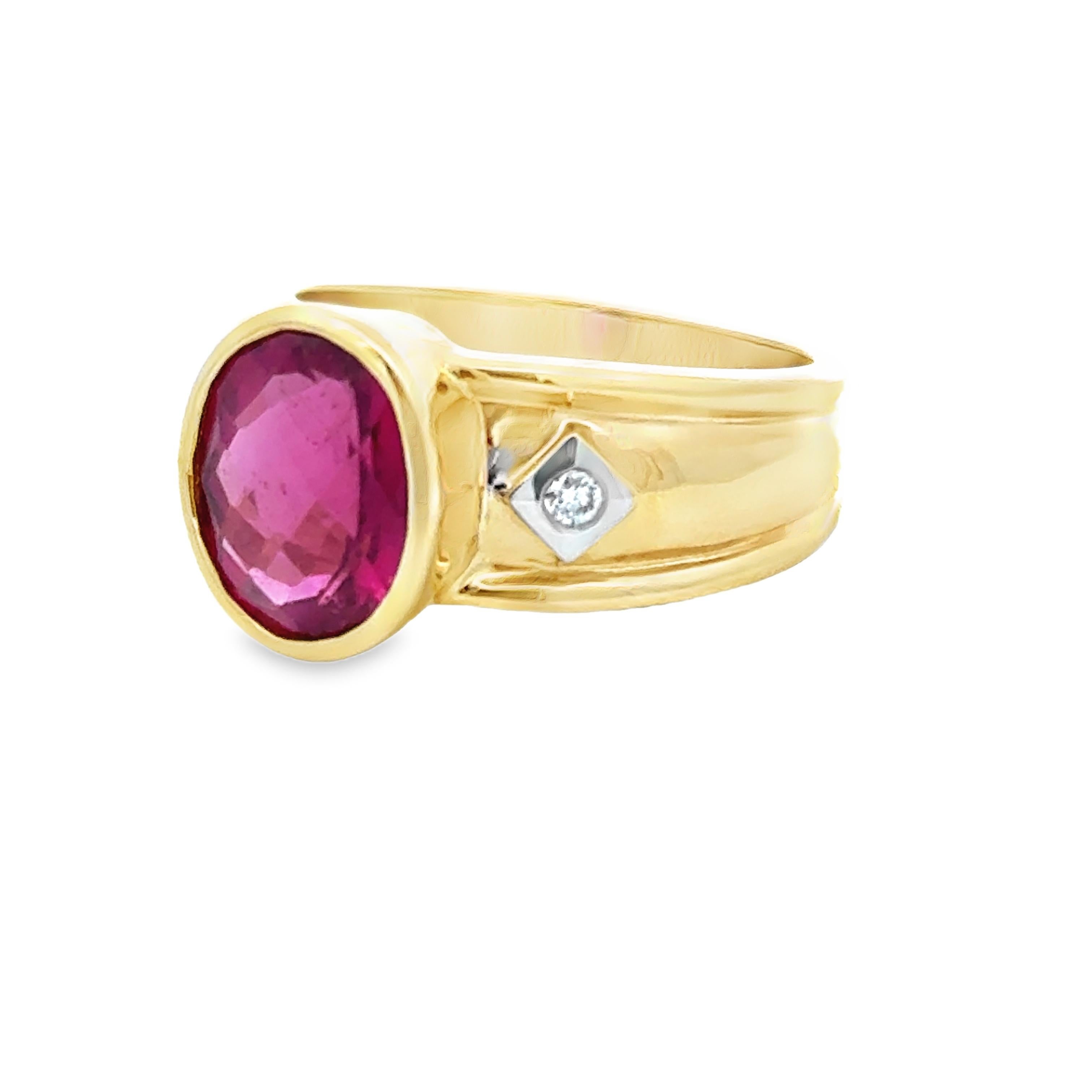 Expertly crafted in 14K gold, this ring showcases a vibrant 2.66 oval rubellite gemstone and sparkling diamonds. The deep red-pink hue of the rubellite is sure to make a statement, while the diamonds add a touch of elegance and luxury. Own this