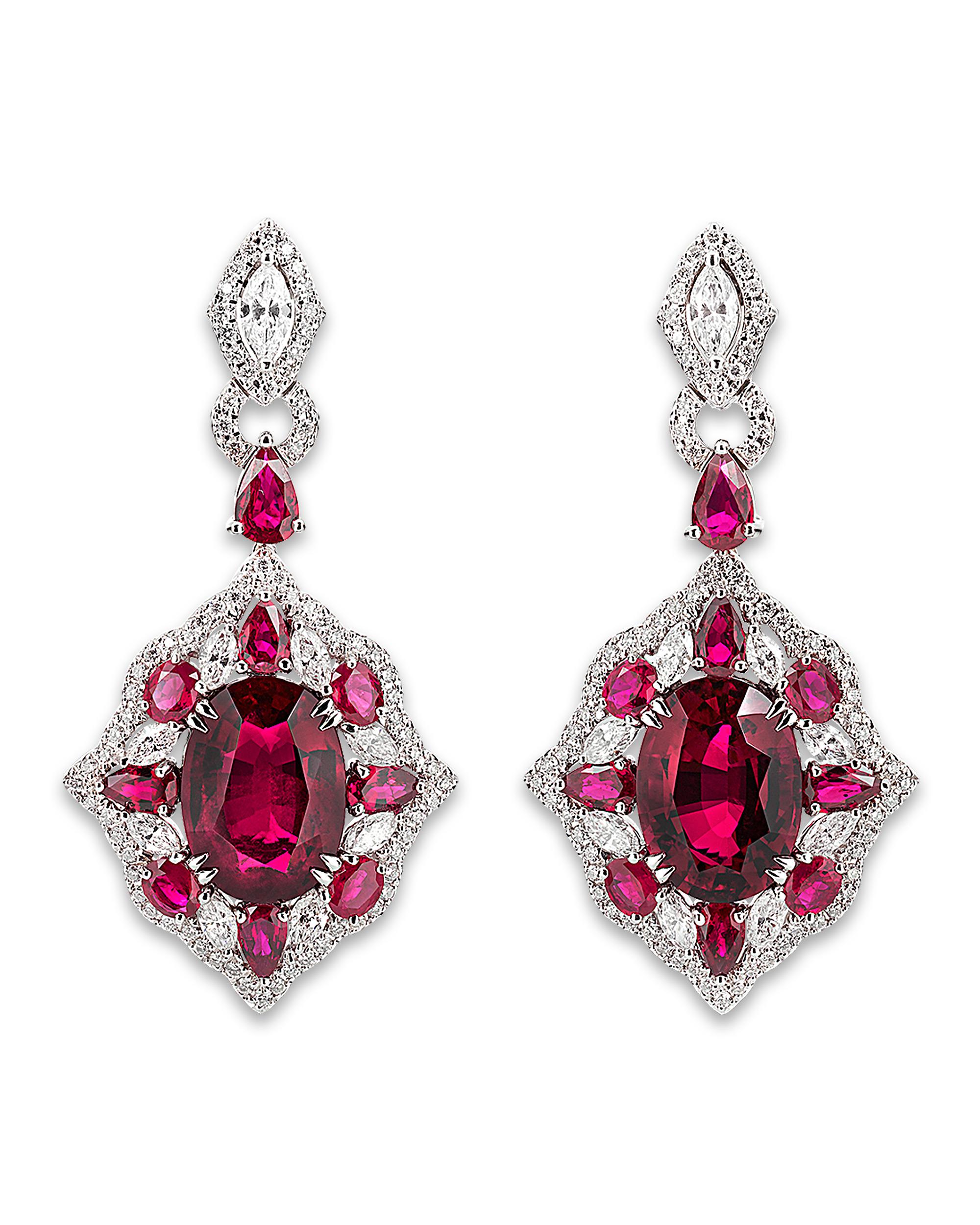 The rich crimson hue of rubellite tourmalines is beautifully complemented by brilliant white diamonds in these extraordinary earrings. Two rubellites totaling 11.15 carats are the stars of the wearable treasures, exuding elegance and luxury.