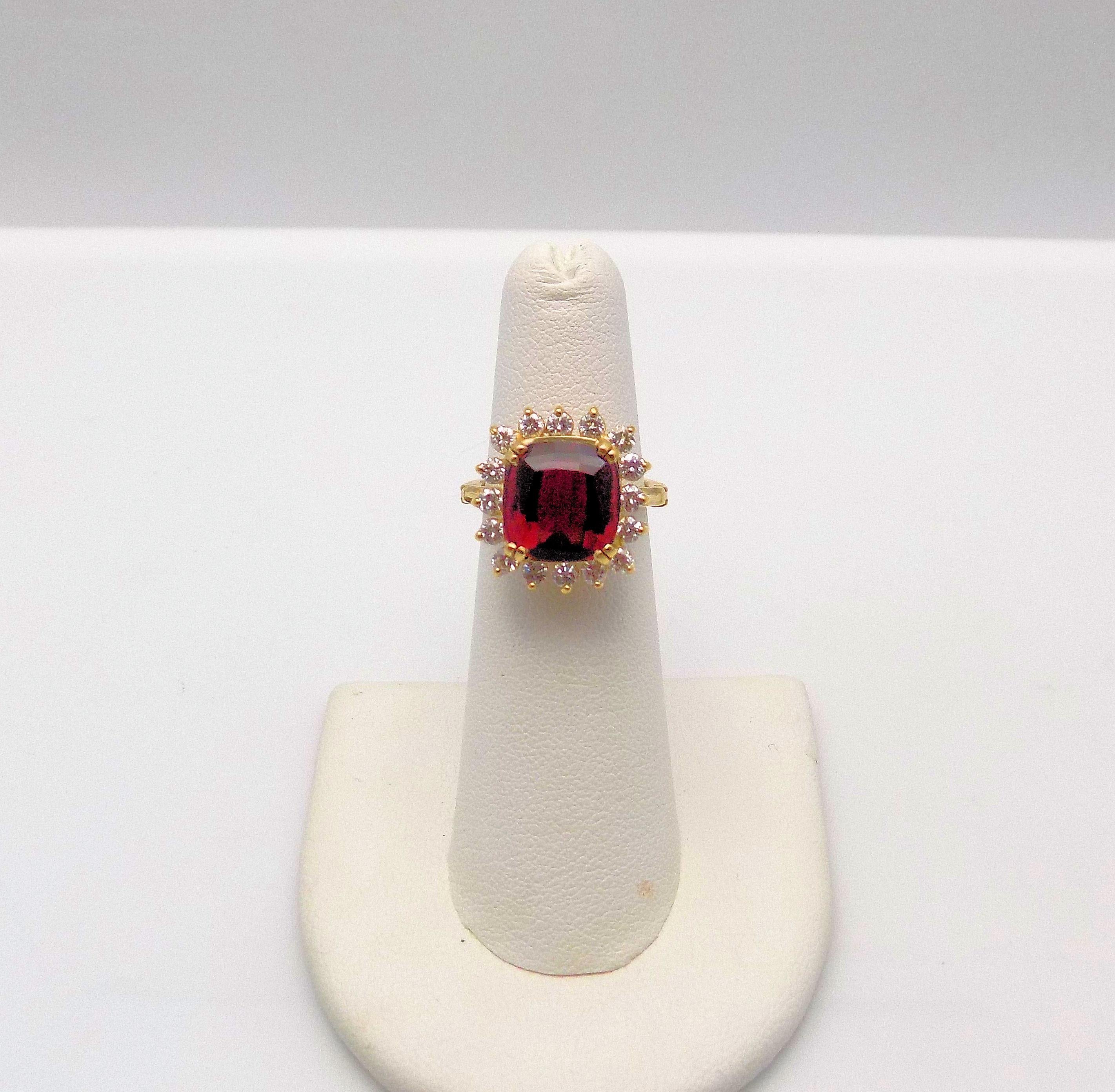 Classic 14 Karat Yellow Gold Ring Featuring 1 Cushion Cut Rubellite 3.81 Carat, 16 Round Brilliant Diamonds 0.96 Carat Total Weight, SI-1 toSI-2, G-H with Expandable Shank.  Ring Size/Finger Size 5; 3.9 DWT or 6.07 Grams.