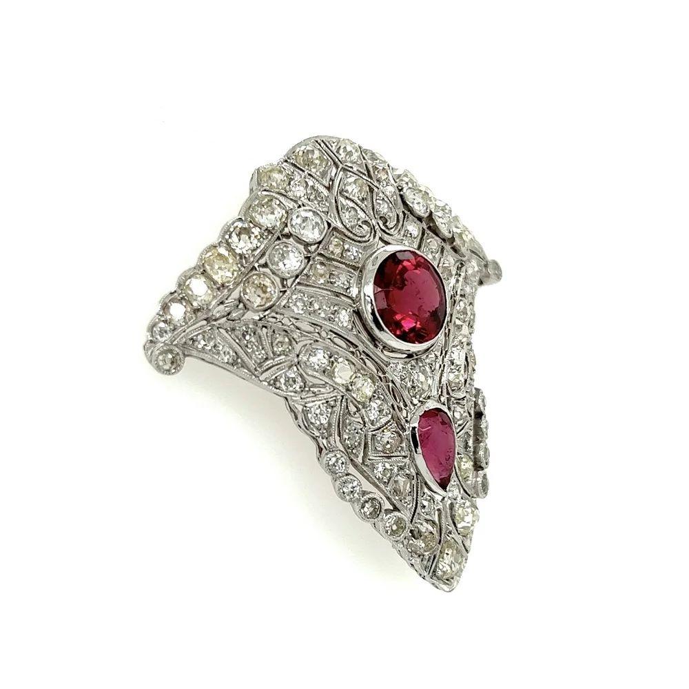 Simply Beautiful! Finely detailed Vintage Art Deco Rubellite and Diamond Filigree Platinum Brooch. Beautifully Hand crafted Filigree Milgrain Platinum and Hand set with Diamonds, weighing approx. 6.00tcw and Rubellite, approx. 5tcw. Brooch measures