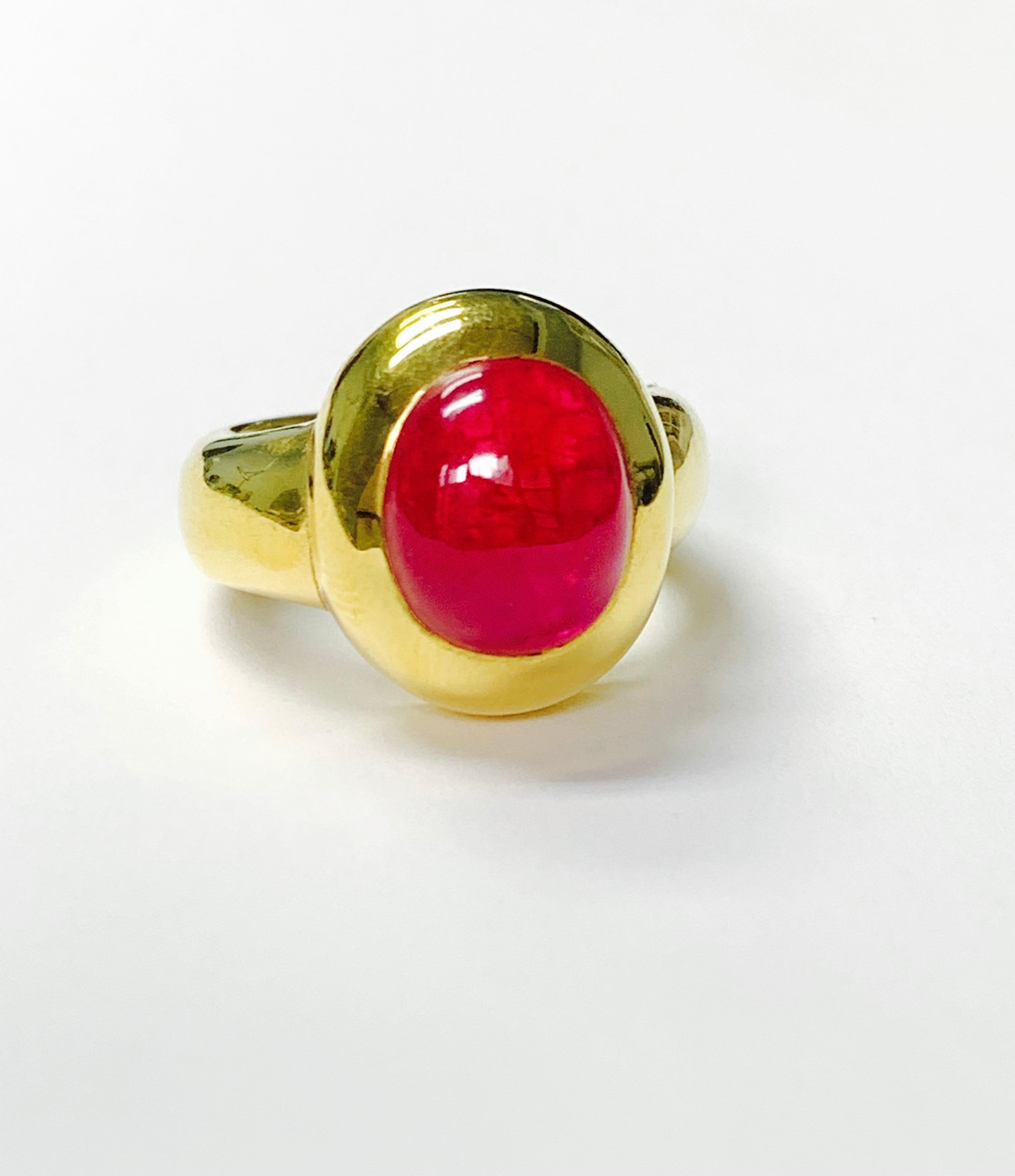 Rubellite cabochon Engagement Ring In 18K Yellow Gold. 
The details are as follows : 
Rubellite cabochon weight : 6.73 carat 
Metal : 18k Yellow Gold 
Ring size : 6 3/4 

