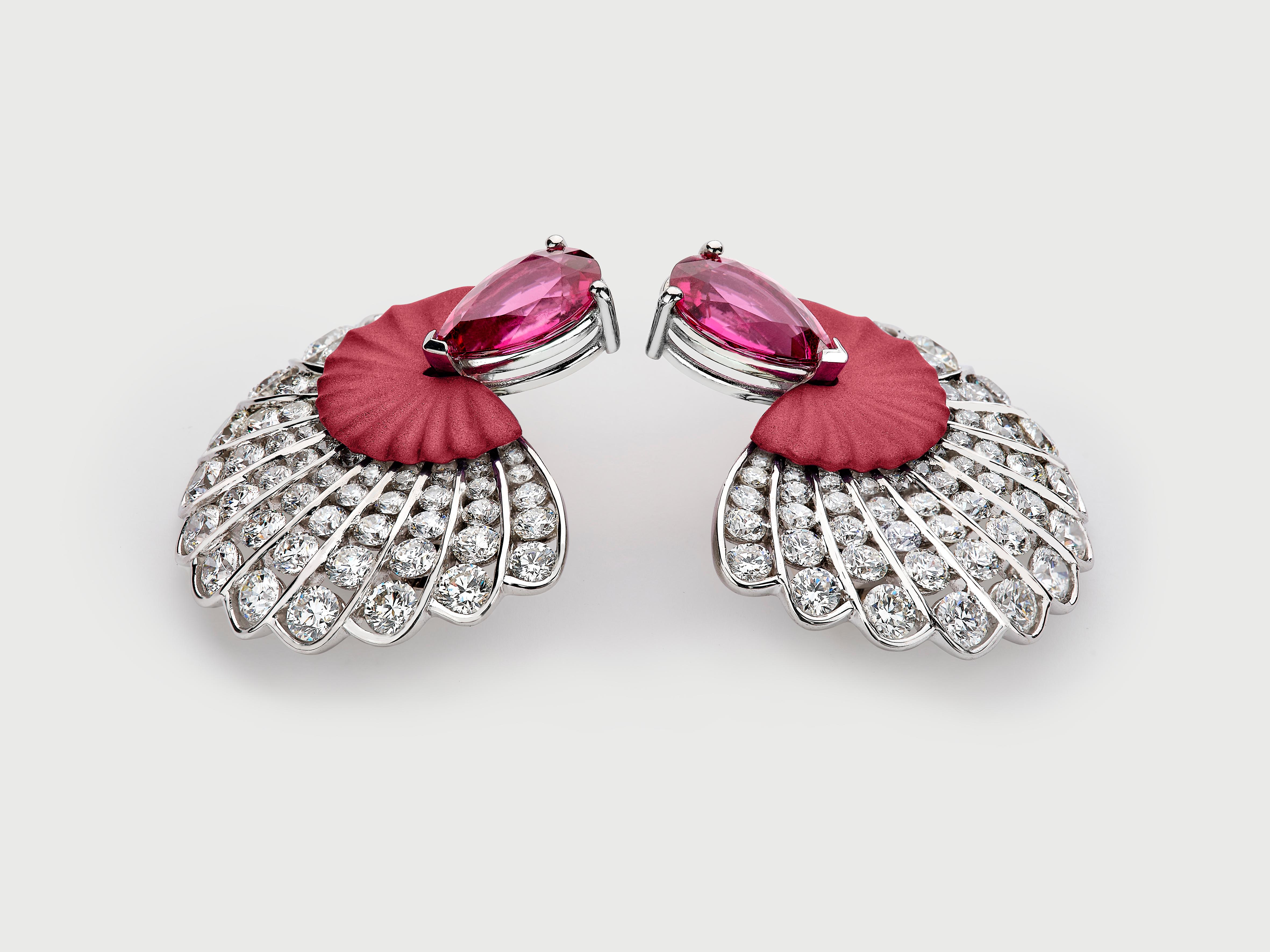 Earrings handcrafted in 18K White Gold and Pink Titanium with Rubellites and White Diamonds
Pear Cut Rubellite Tourmalines: 9.92 cts, 
White Diamonds Round Brilliant Cut F-G/VS2-Si1: 16.72 cts,
18K White Gold Weight: 36 gr.

These earrings are made