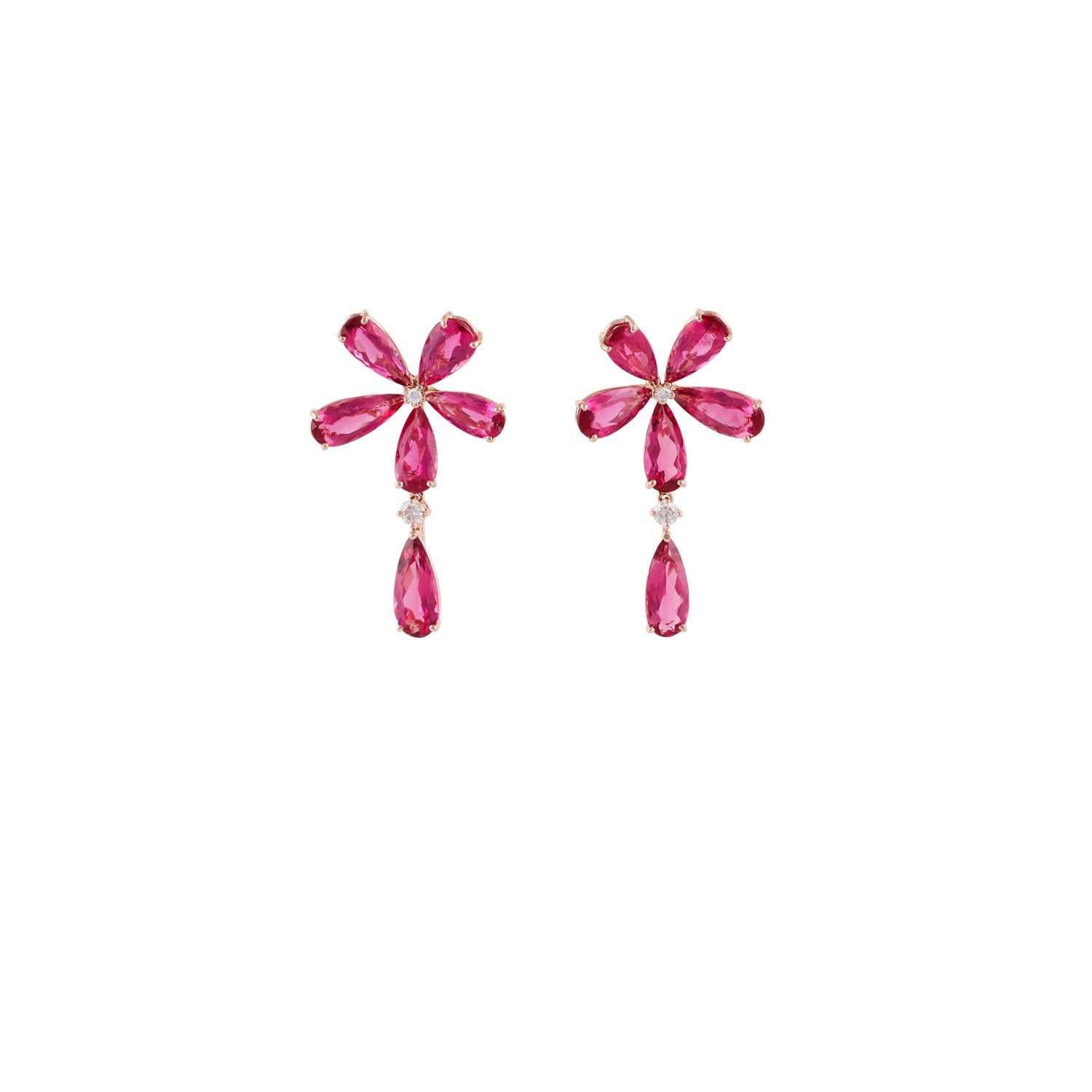 An exclusive earring with pear-shaped rubellite & round-shaped brilliant-cut diamonds studded in 18K rose gold, earrings have 12 pieces of fine quality rubellites weight 12.53 carats & 4 pieces of diamonds weight 0.27 carat the total gold weight is