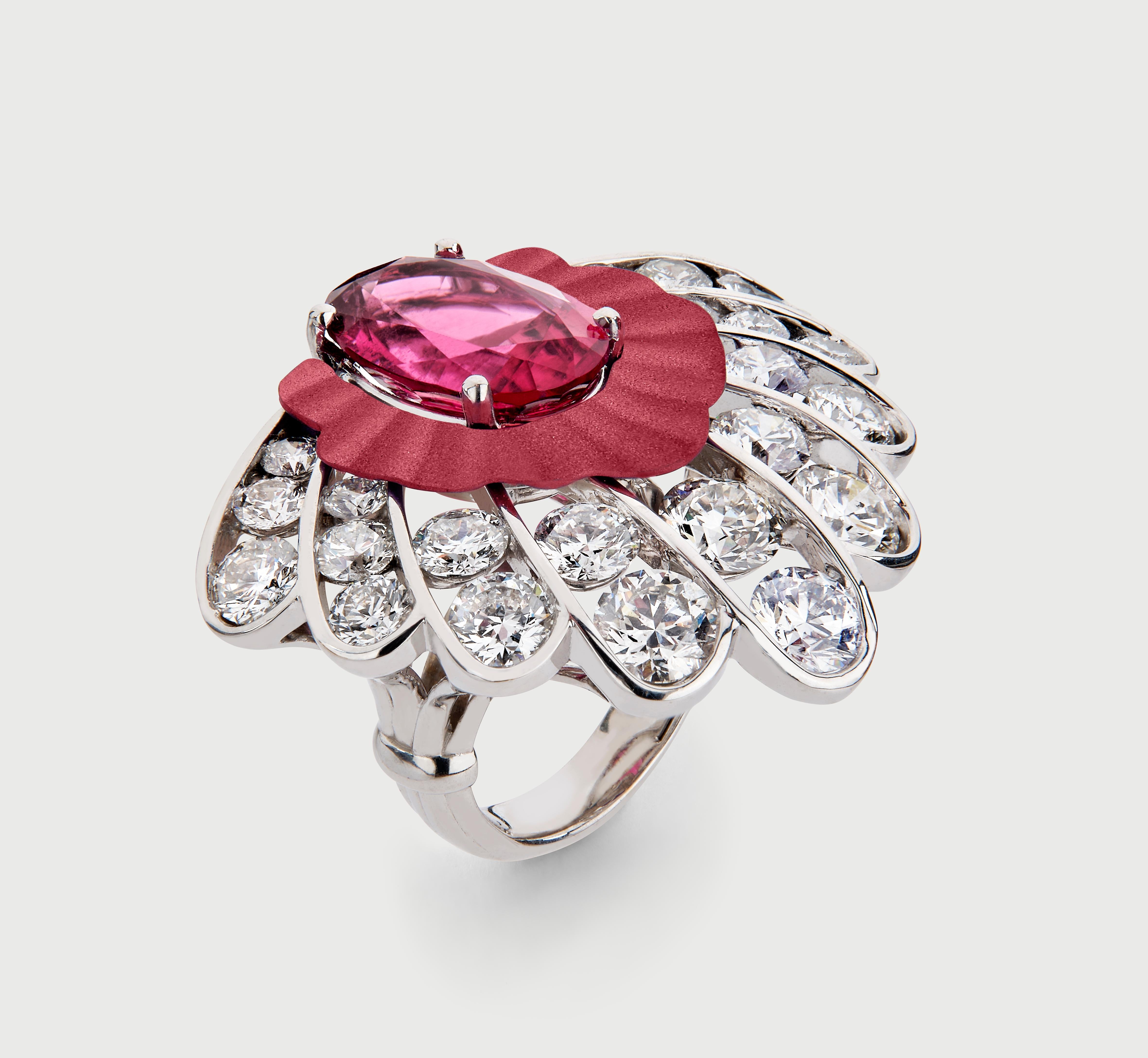 Ring handcrafted in 18K White Gold and Pink Titanium with Rubellite and White Diamonds
Oval Cut Rubellite Tourmaline: 7.07 cts White Diamonds Round Brilliant Cut F-G/VS2-Si1: 1.2 cts
18K White Gold Weight: 18.6 gr.

This ring is made to order