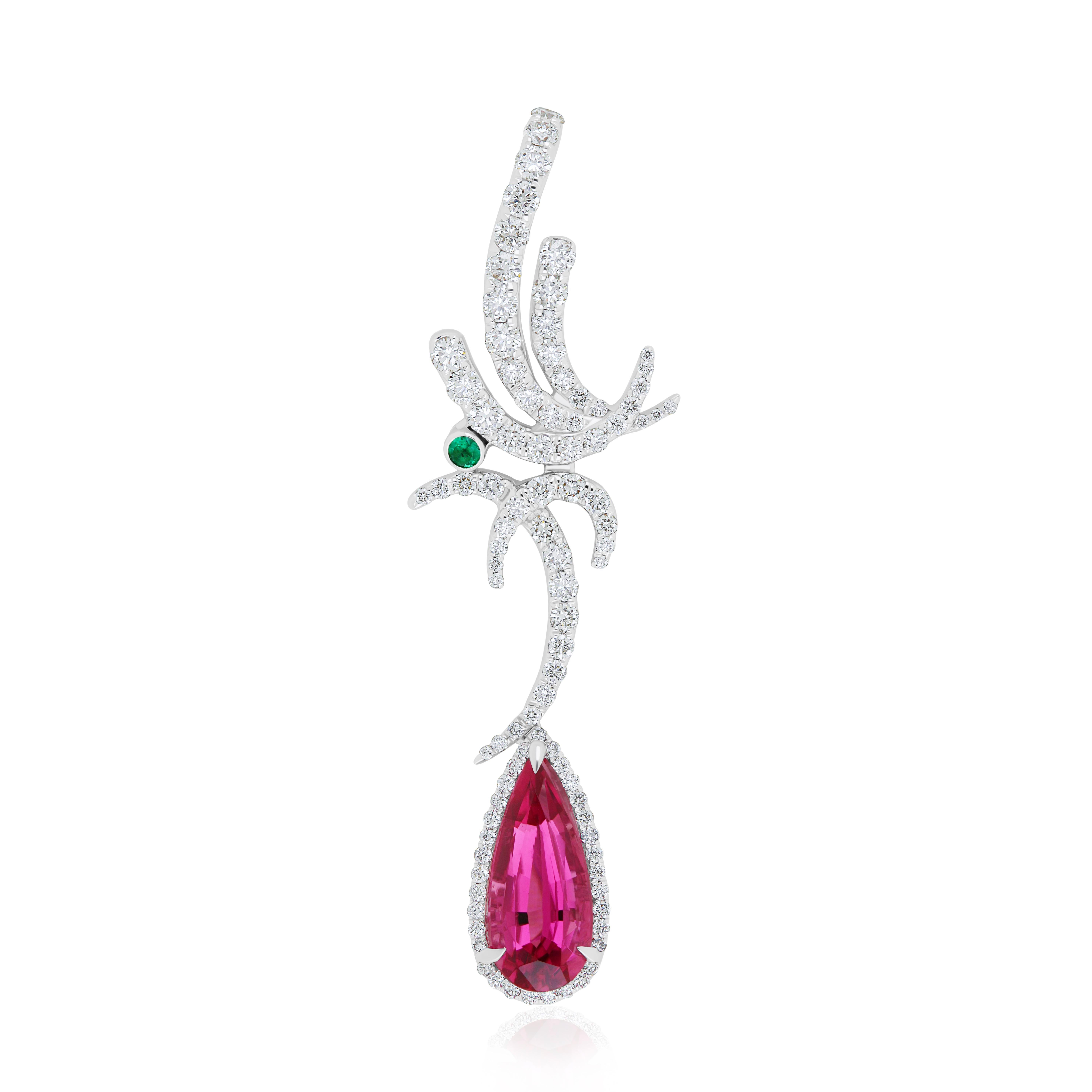 Crafted with precision and sophistication, this gold pendant boasts a captivating 1.5 carat (approximately) pear-shaped rubellite, complemented by vivid green emeralds to amplify its allure. Enhanced with micro pave-set diamonds weighing
