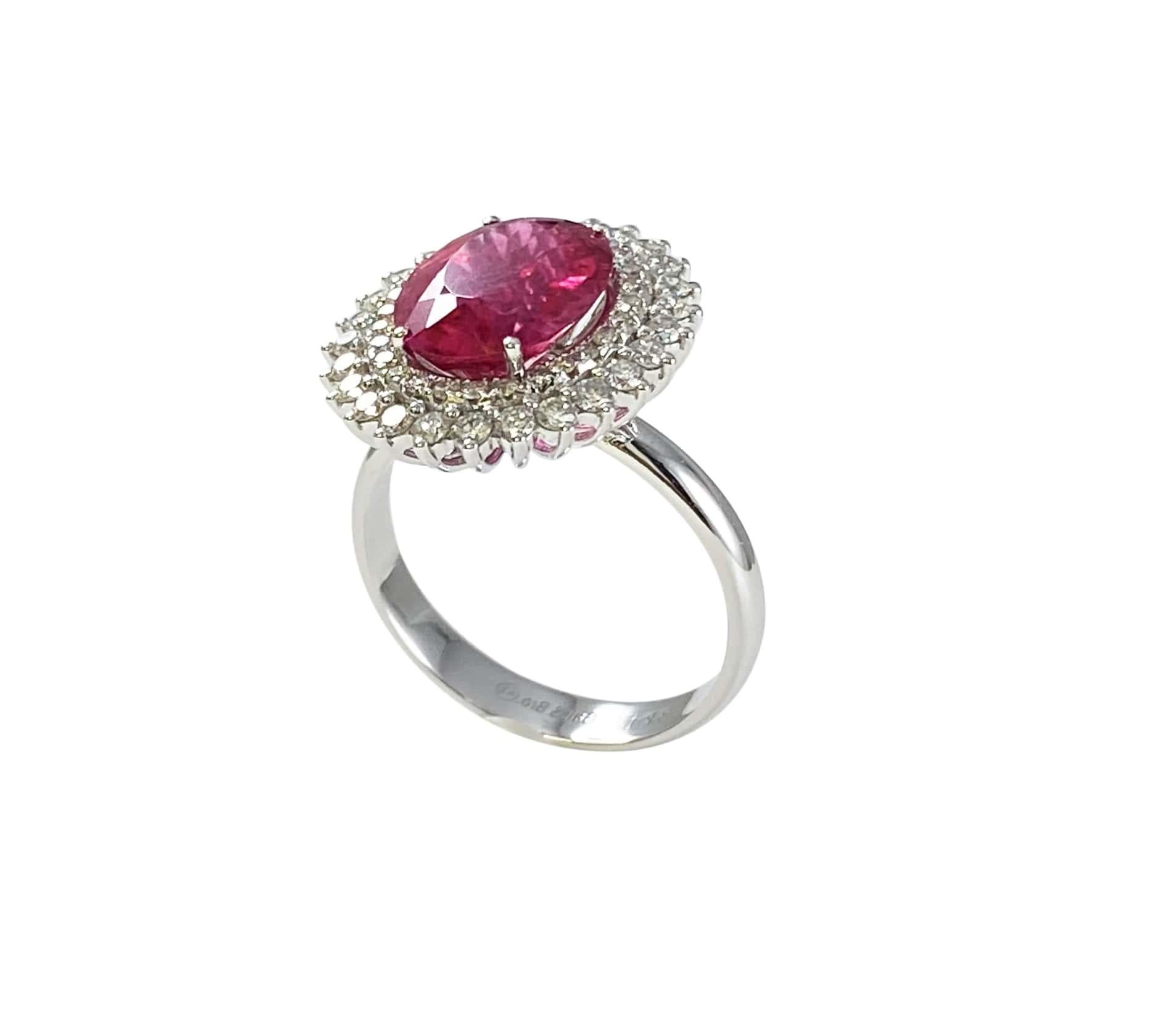Rubellite Pink Tourmaline Double Diamond Halo Sun Ray 18 Karat White Gold Ring
18 Karat White Gold
3.00 CT Pink Tourmaline/Rubellite
1.50 CT Diamond of G Color/VS Clarity
Size 7, Resizable upon request 

Important Information:
Please note that this