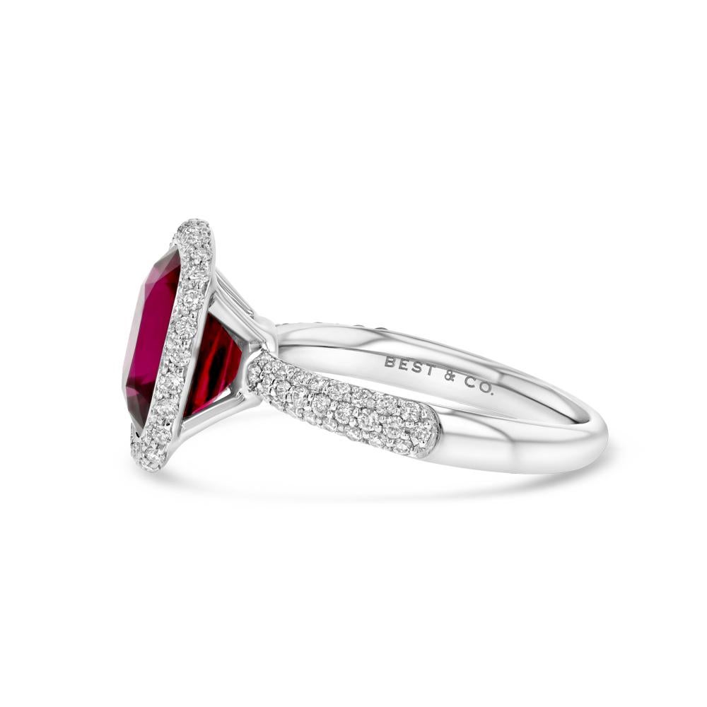 With a white gold band halfway covered in pavé set diamonds, and a stunning rare rubellite encased by even more diamonds, this ring will bring classical elegance to any hand it graces.  