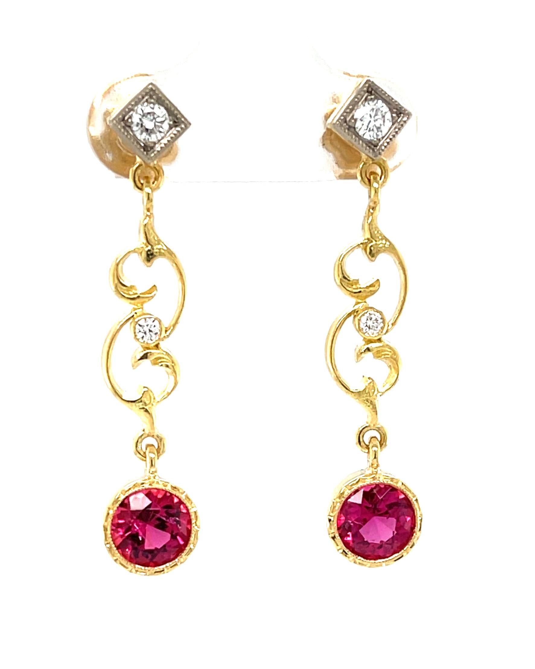 These dangling tourmaline and diamond earrings are so pretty and feminine - a perfect way to add a bright pop of color and effortless elegance to your day! Beautifully vivid pink rubellite tourmaline rounds are set in handcrafted bezels and dangle