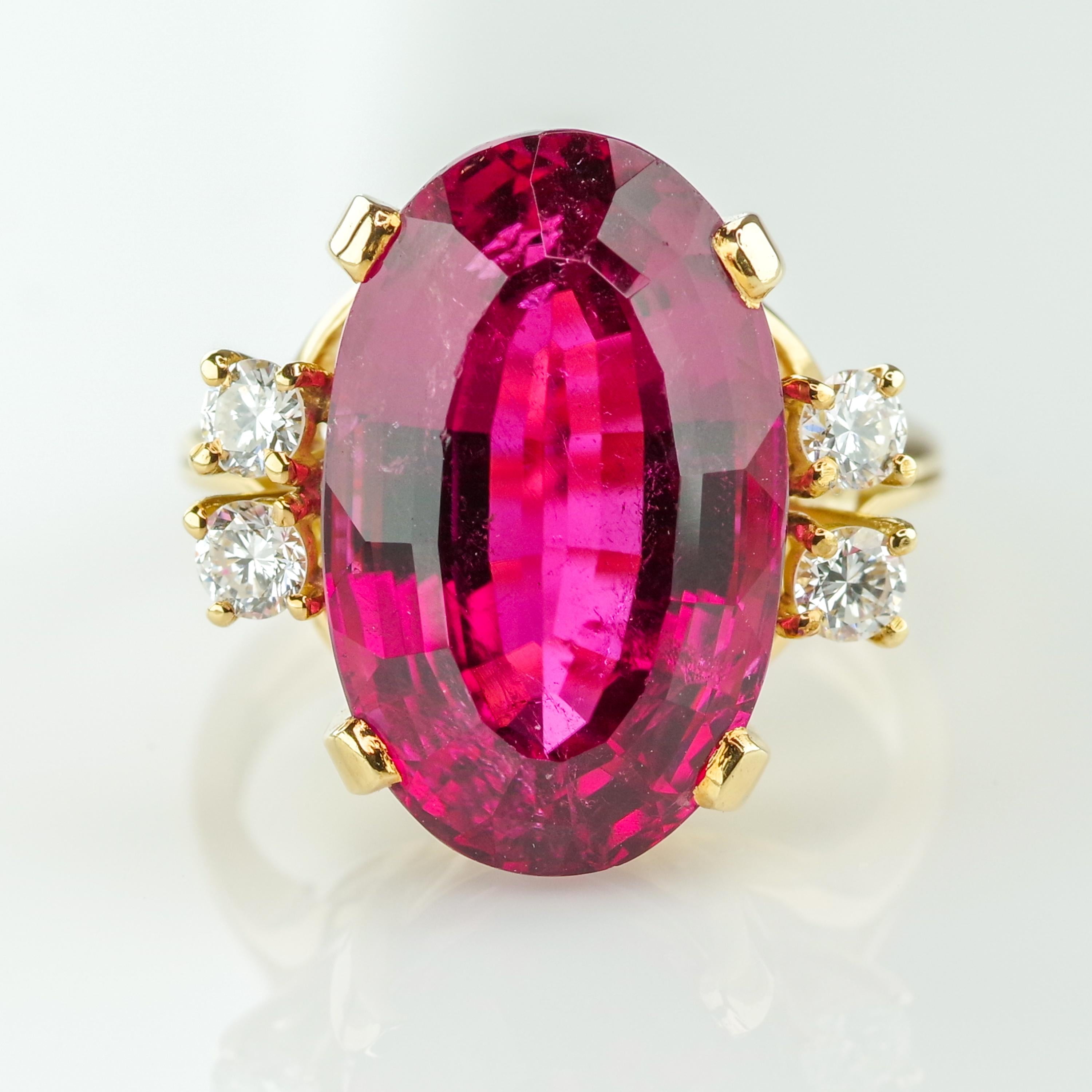 Created by the iconic Brazilian jeweler, Amsterdam Sauer, known for their use of extraordinary Brazilian gemstones, this magnificent ring features a nearly 10-carat oval-cut Brazilian rubellite tourmaline of the finest color and uncommon clarity. On