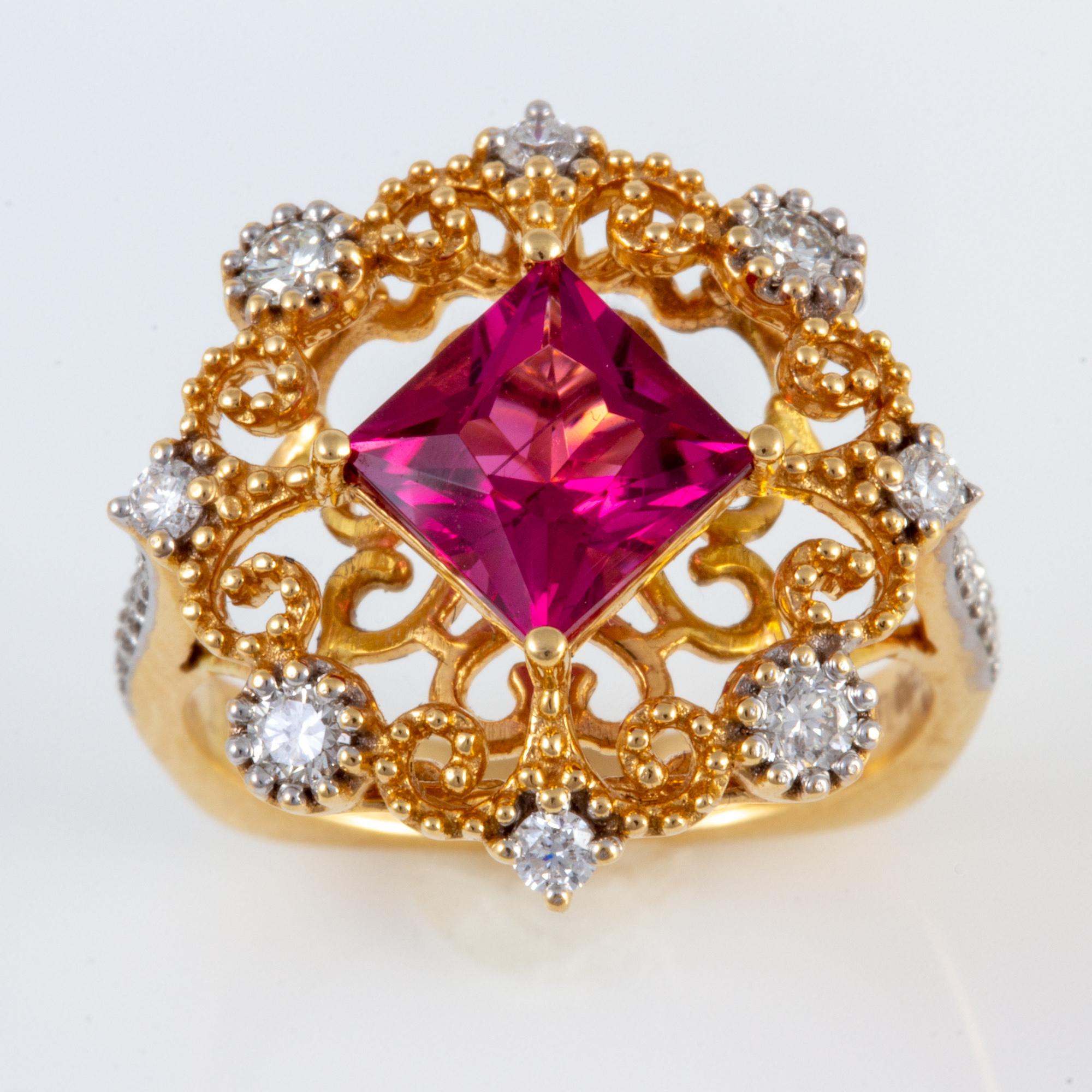 Set in 18 karat gold, this stunning Rubellite Tourmaline features a 1.76 cts Princess cut center stone and .47 cts. of diamonds.  Hand carved and engraved making this a very special artisan piece.

Created by noted jewelry designer David Meelheim