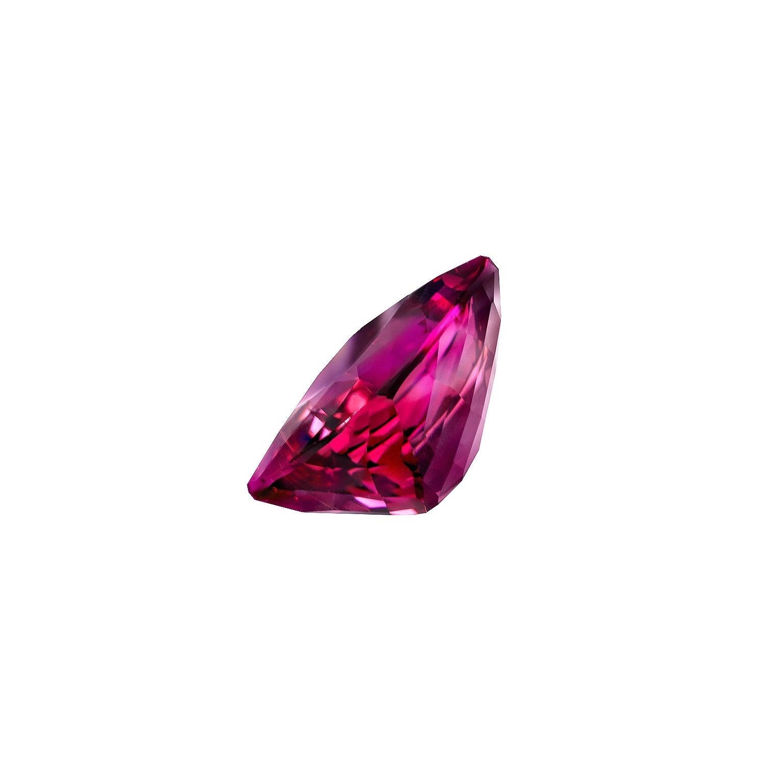 Superior 8.86 carat Rubelite Tourmaline cushion cut unmounted gemstone.
This collection quality gem is offered loose to a very special lady or gentleman. 
Returns are accepted and paid by us within 7 days of delivery.
All images are magnified to