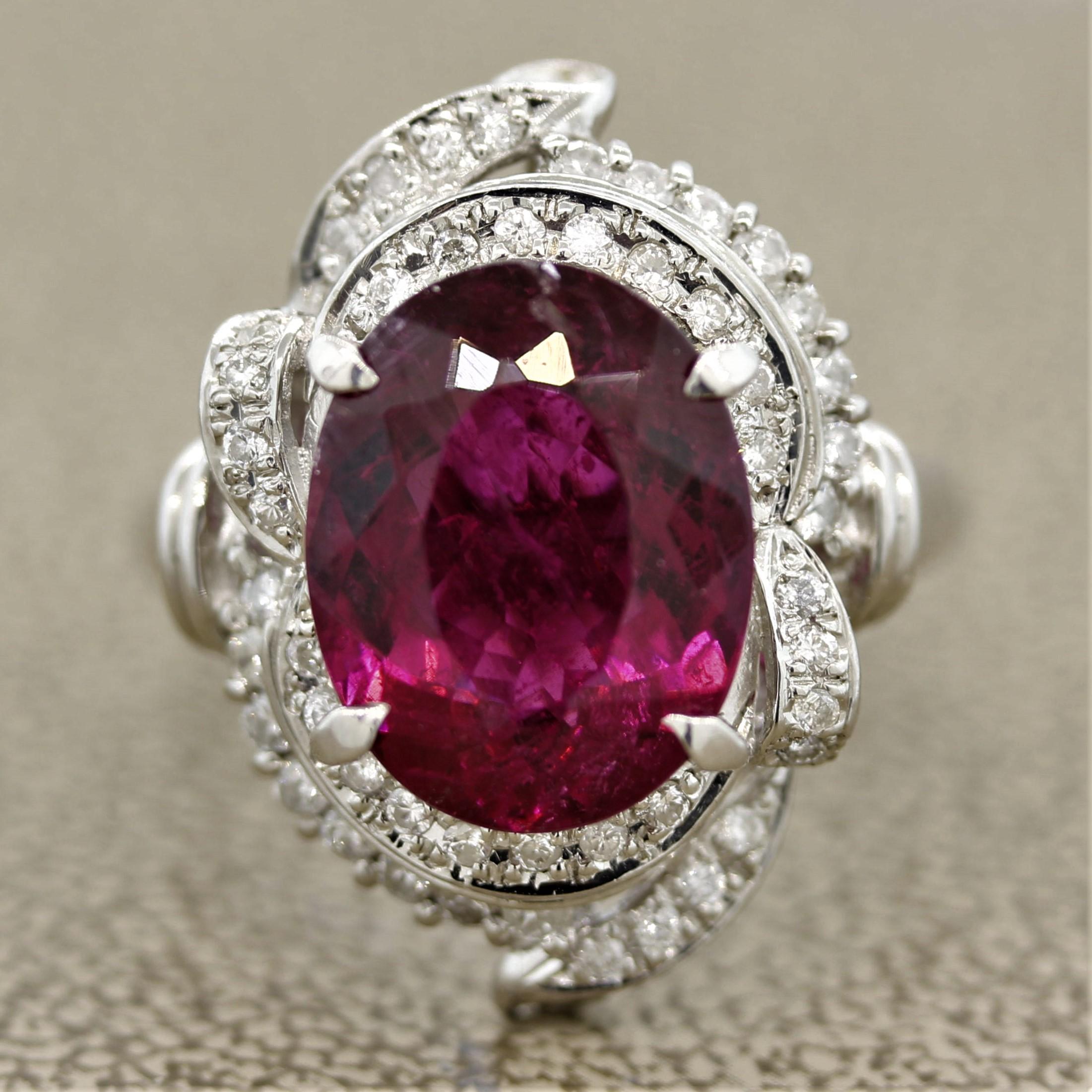 An exceptional tourmaline weighing 6.03 carats is featured in this platinum ring. It has an intense and vivid red color that rivals the finest rubies which is why this variety of tourmaline was given the name “Rubellite.” It is free of any