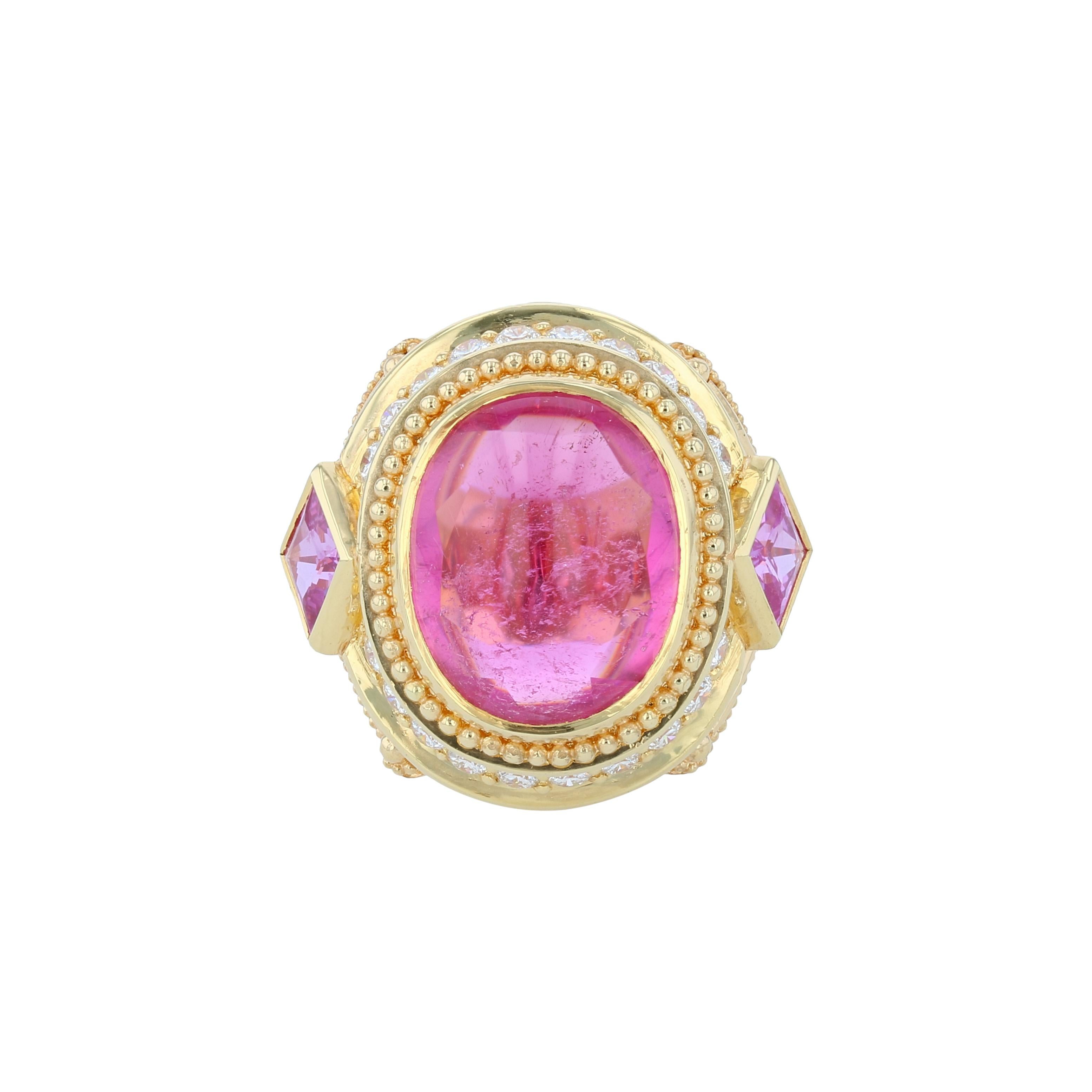 From the Kent Raible one of a kind 'Masterworks' collection, we bring you this stunning hand fabricated jewel, 'Rubellite Crown Ring'.
This is a classic Raible. Embellished with 18K gold granulation, and elegant detailing, the seven carat Rubellite