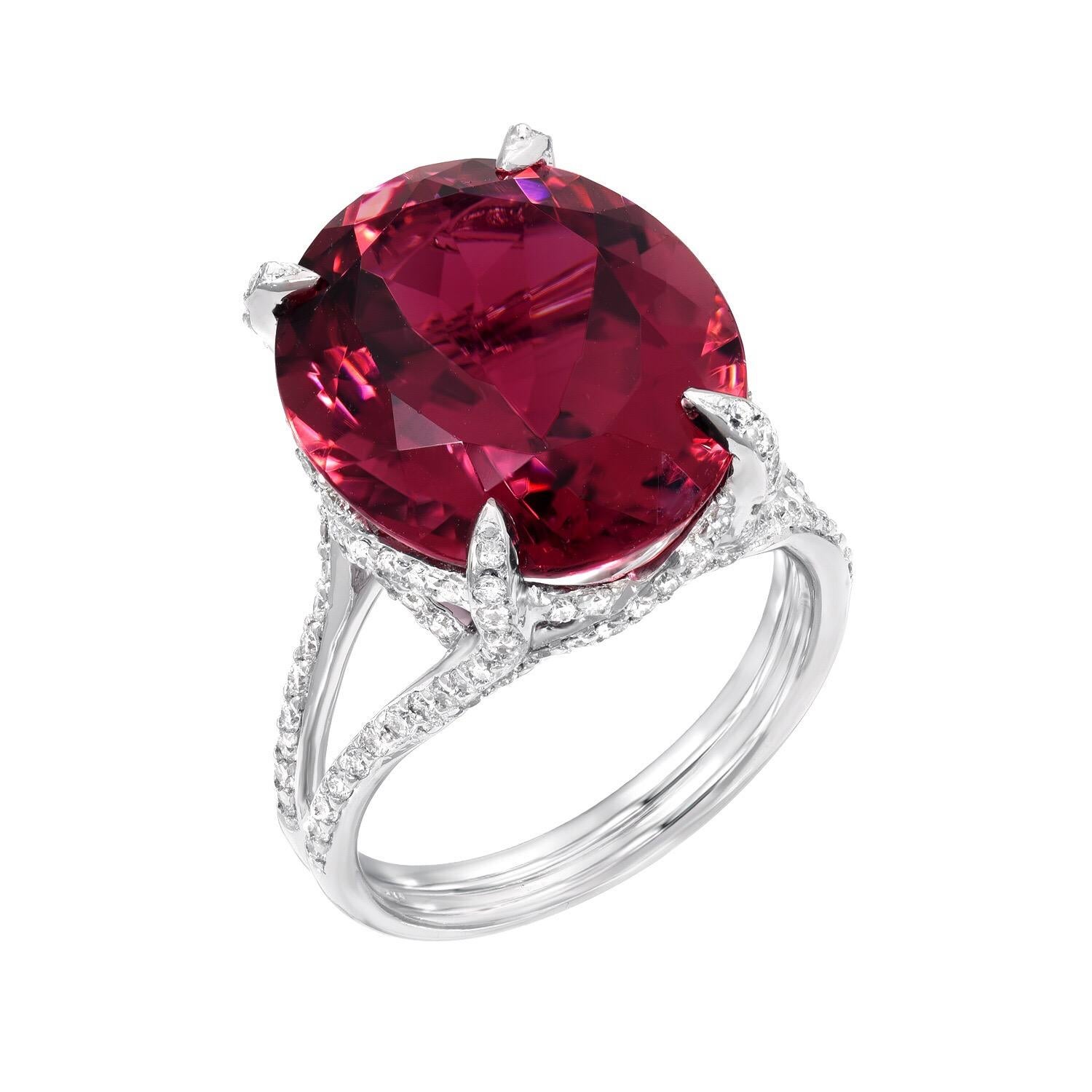 Remarkable Rubelite Tourmaline oval, weighing a total of 11.90 carats, is adorned by a total of 0.88 carats of micro pave diamonds, in this 18K white gold ring.
Size 6.5. Resizing is complimentary upon request.
Returns are accepted and paid by us
