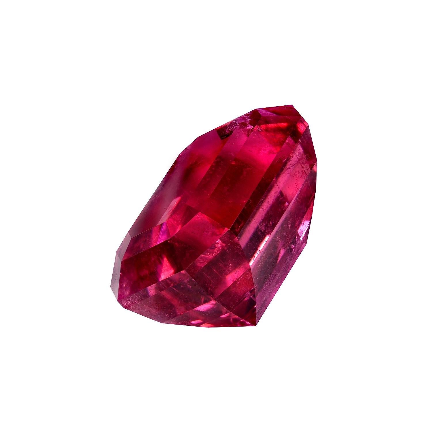 Remarkable 17.26 Rubelite Tourmaline emerald-cut gem, offered loose to a gemstone lover.
Returns are accepted and paid by us within 7 days of delivery.
All images are magnified to provide you with closer detail. 
We offer supreme custom jewelry work