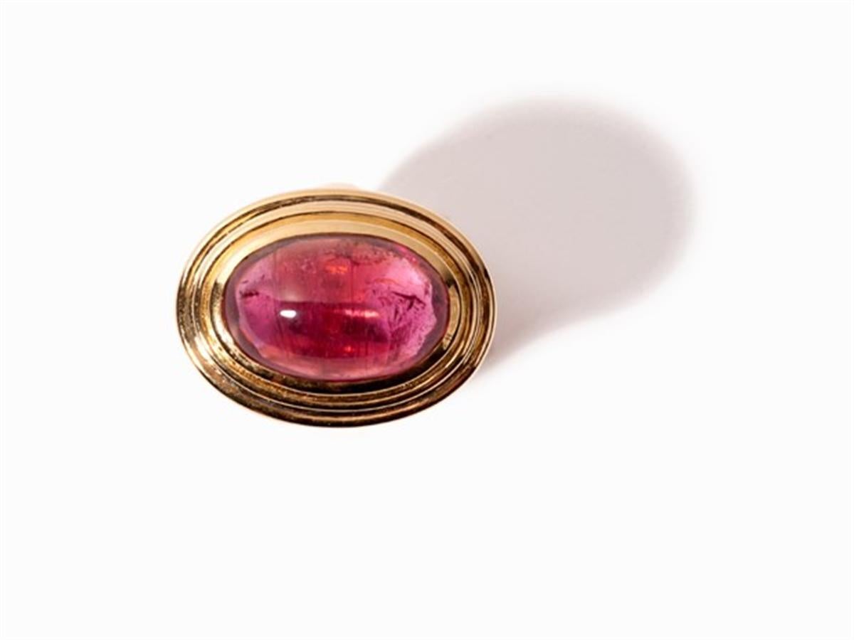 Ring with rubellite of  15,05 Ct, 18 K yellow gold
delineation
- 18 carat yellow gold
- Italy, 2004
- Inside punched with the fineness 