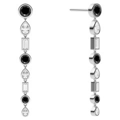 Ruben Manuel Winter-Ohrringe. VS Weiße Diamanten und schwarze runde Diamanten im VS-Stil.