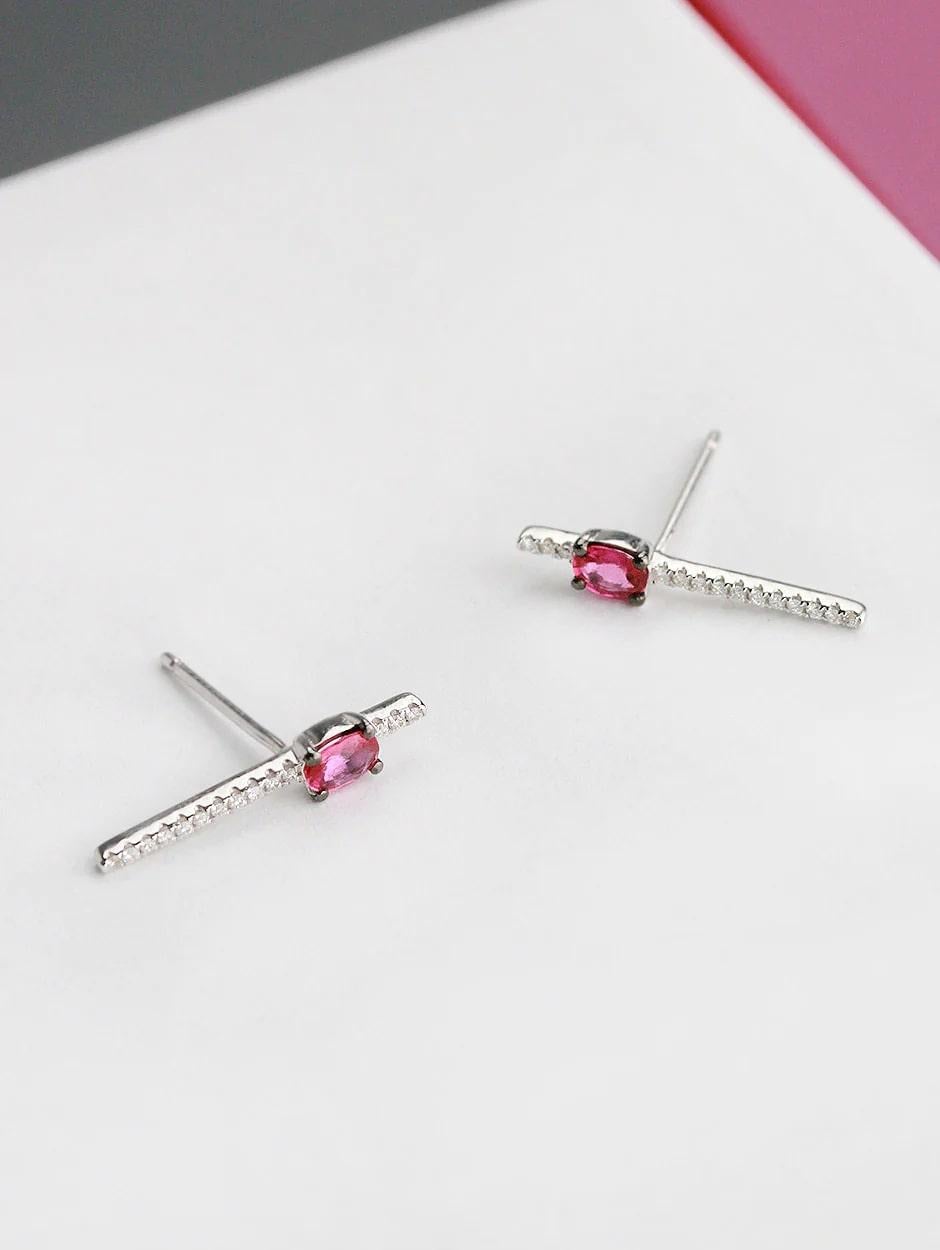 Combination of micro pave white diamond and ruby cuff earring, all with a high polish finish. Available in 18K White Gold.

Diamond Type : Natural Diamond
Metal : 18K
Metal Color : White Gold
Diamond Carat Weight : 0.06ttcw
Rubies Carat Weight :