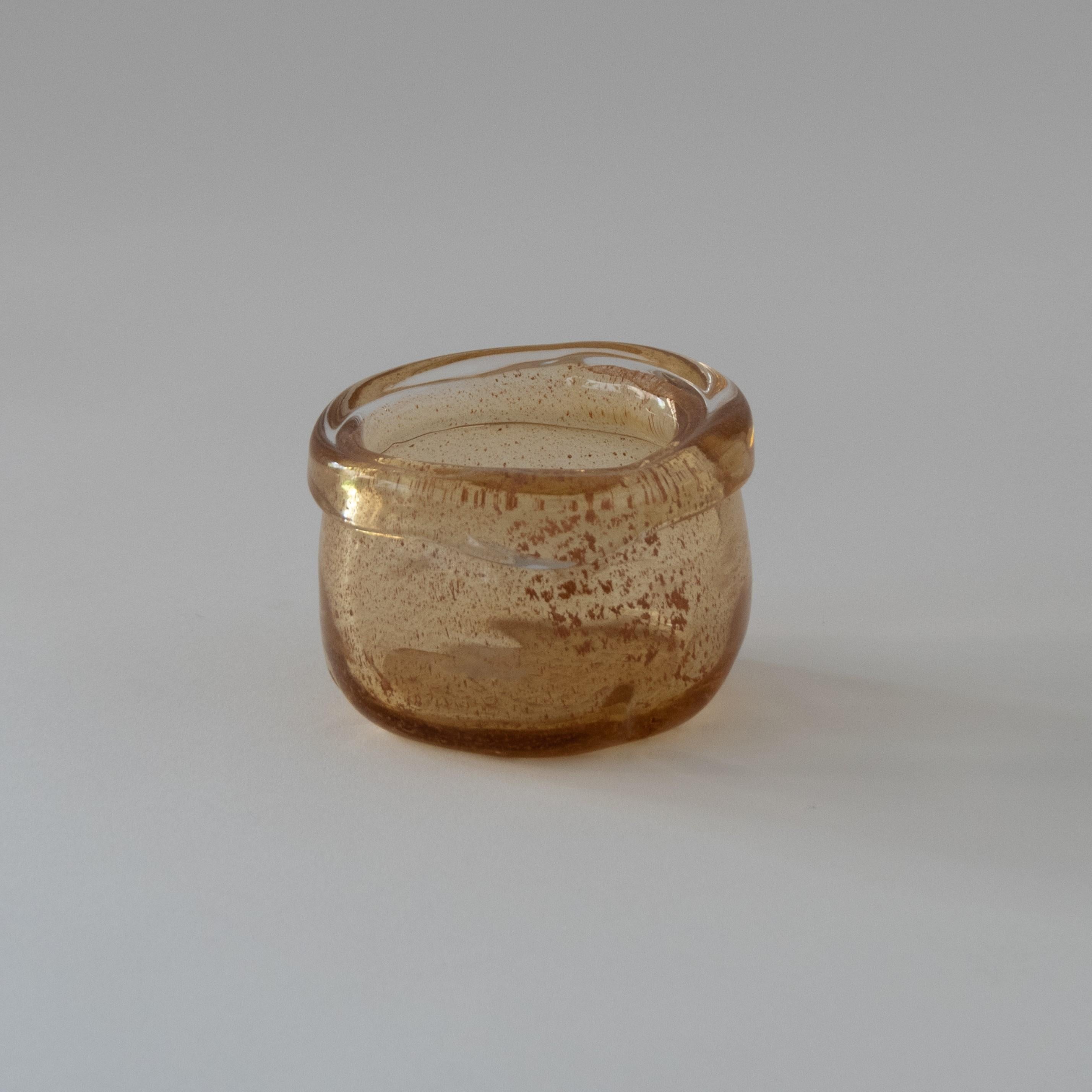 Rubi glass cup by Studio Terre
One of a Kind
Dimensions: 7 x H 8 cm
Materials: Amber-coloured Murano glass cup with terracotta powder
Avaiable to order in sets of 3 or 6 pieces.

STUDIO TERRE, an experimental art studio where art is created