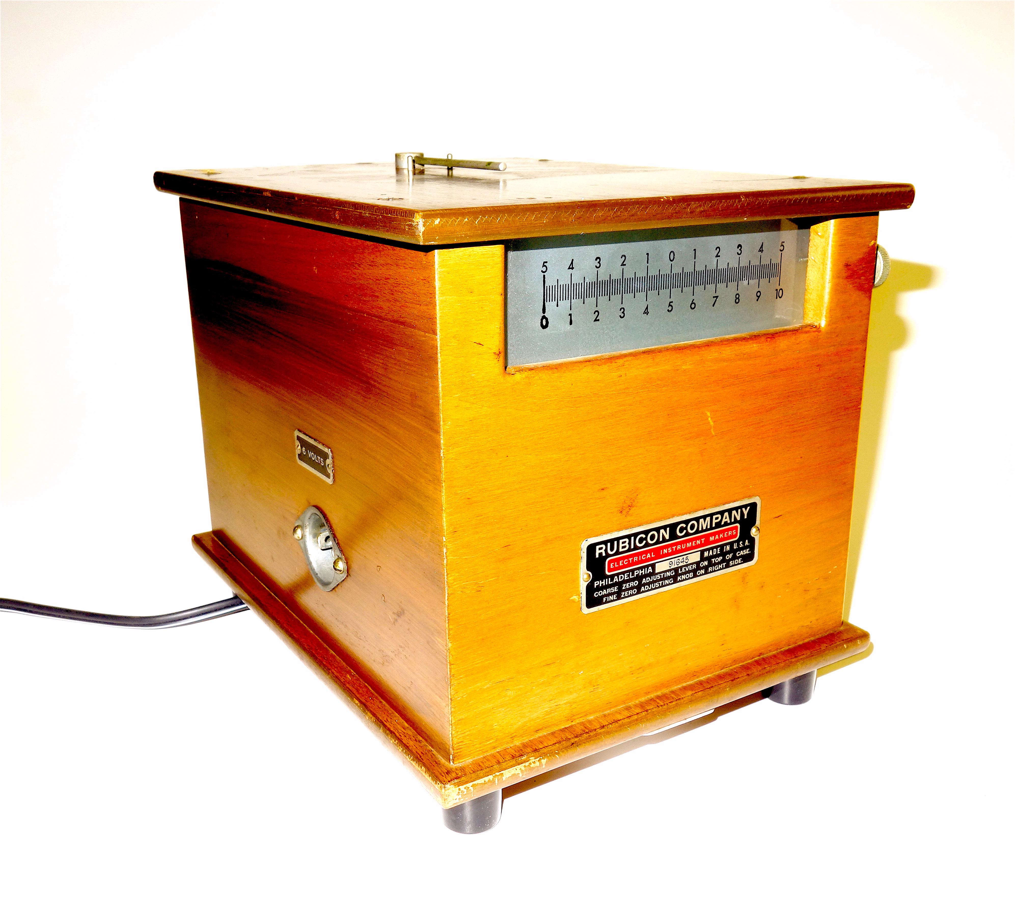Submitted for your consideration is this rare Rubicon Reflecting Galvanometer, circa mid-20th century.
Presenting in the original wood (appears to be mahogany) cabinet housing with glass dial for illuminated readings. Still operational it appears,