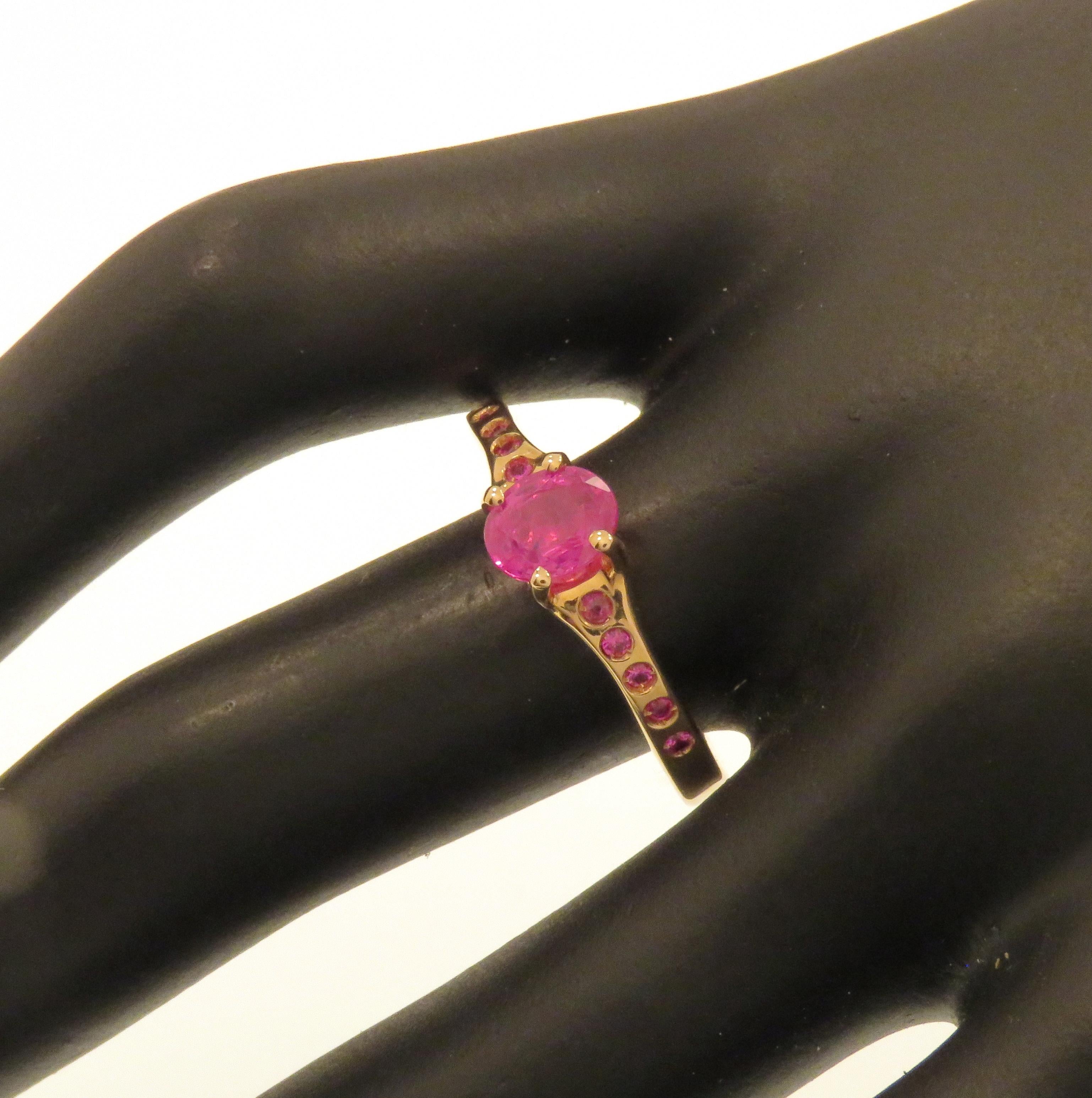 Stunning solitaire ring featuring a natural ruby oval cut and 10 rubies on the ring shoulders. Handmade in 9k rose gold. Marked with the Italian gold mark 375 and Botta Gioielli brandmark 716MI.
Jewelry report: AIG no. J5320105319.​

Handcrafted in: