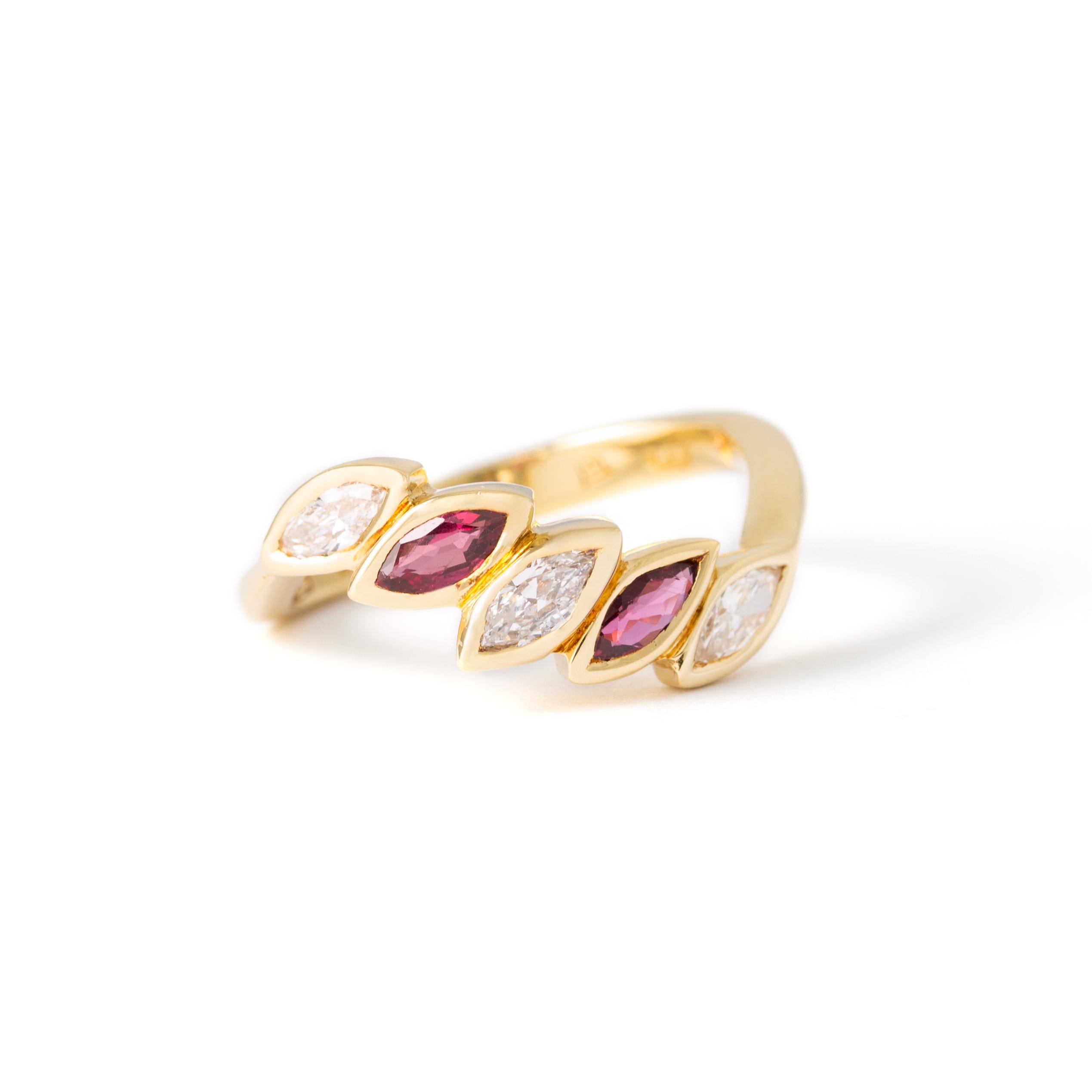 Ring in 18kt yellow gold set with 2 marquise cut rubies 0.52 cts and3 marquise cut diamonds 0.51 cts Size 53