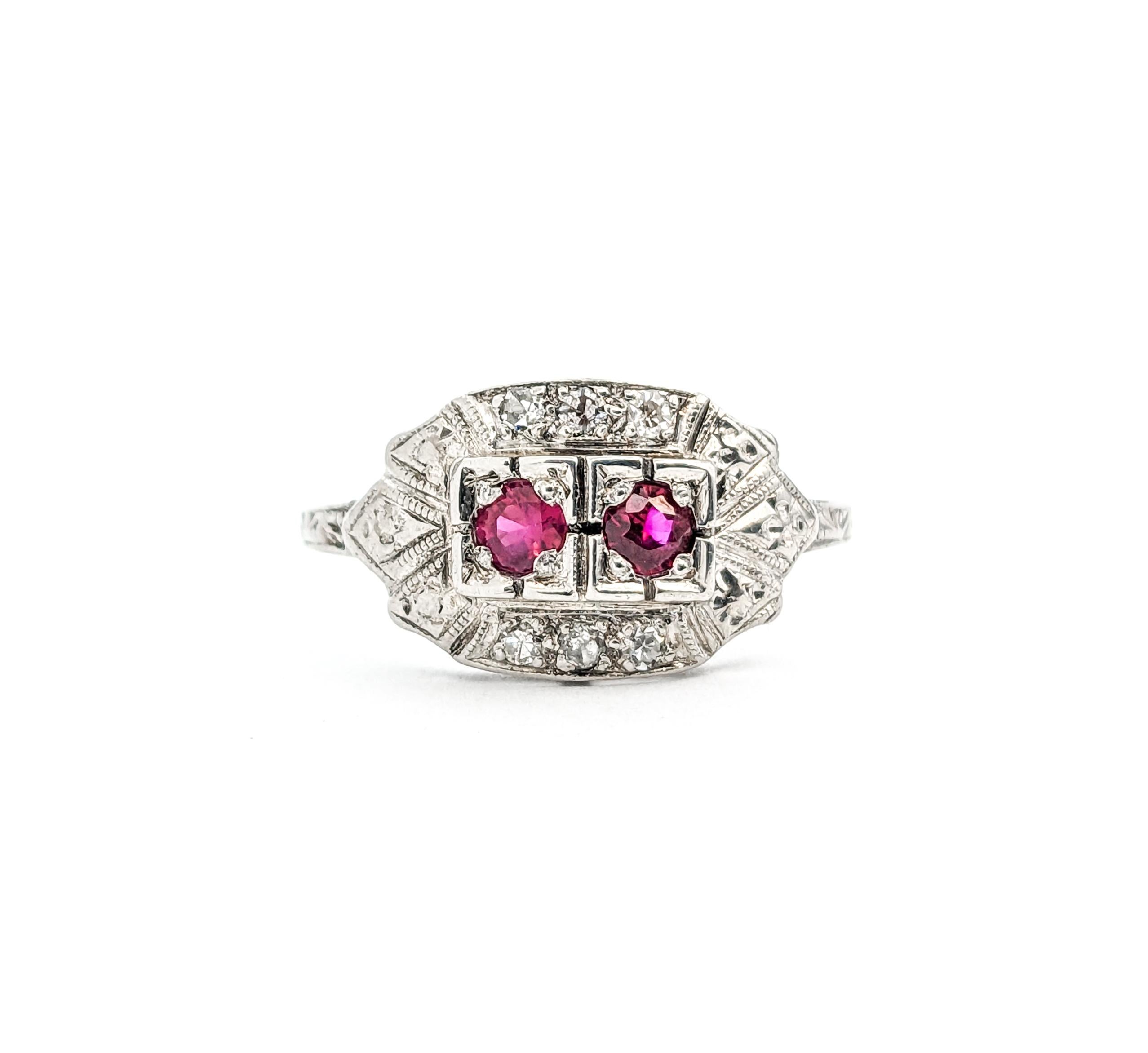 Antique Art Deco Ruby & Diamond Ring in Platinum

Presenting a remarkable Antique Ruby Ring, exquisitely crafted in Platinum. This elegant piece is adorned with a .06ctw Single Cut Diamonds centerpiece, harmoniously paired with .20ctw of vibrant