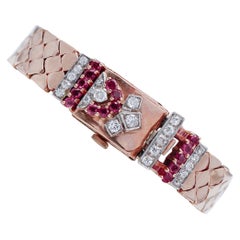 Rubini, diamanti, orologio/bracciale Retrò in oro rosa e bianco 14 carati