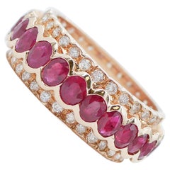 Anello con rubini, diamanti e oro rosa 14 carati