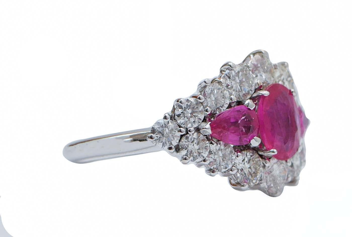 Elegant ring in 14 kt white gold structure mounted with three central rubies surrounded by diamonds.
This ring was totally handmade by Italian master goldsmiths and it is in perfect conditions.
Diamonds 2.39 ct
Rubies 2.28 ct
Total Weight 7.60 gr
RF