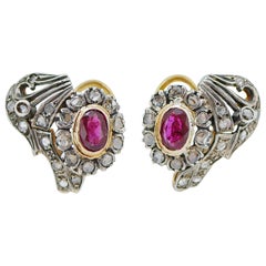 Rubies, Diamonds, 18 Karat Rose Gold and Silver Earrings. Rubies, Diamonds, 18 Karat Rose Gold and Silver Earrings.