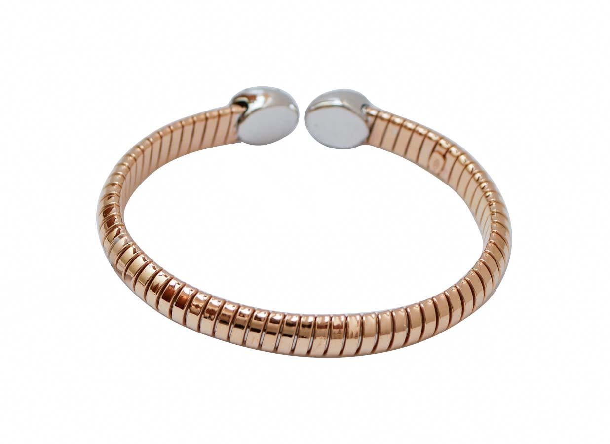 Rétro Bracelet Tubogas en or rose 18 carats, rubis et diamants en vente