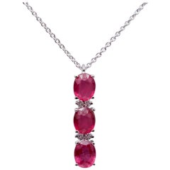 Rubies, Diamonds, 18 Karat White Gold Three-Stones Pendant Necklace