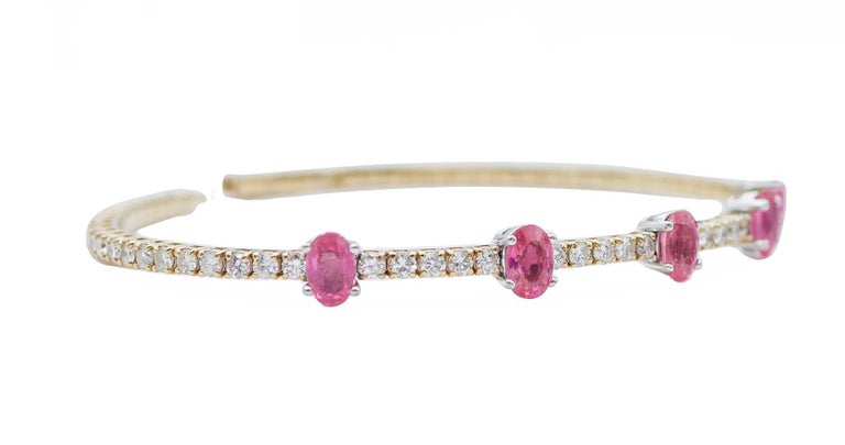 SHIPPING POLICY: 
Shipping costs will be totally covered by the seller.

Amazing modern bracelet in 18 kt yellow and white gold structure mounted with  five rubies and,between of them and for all the bracelet,diamonds.
Diamonds 2.43 ct
Rubies 3.45