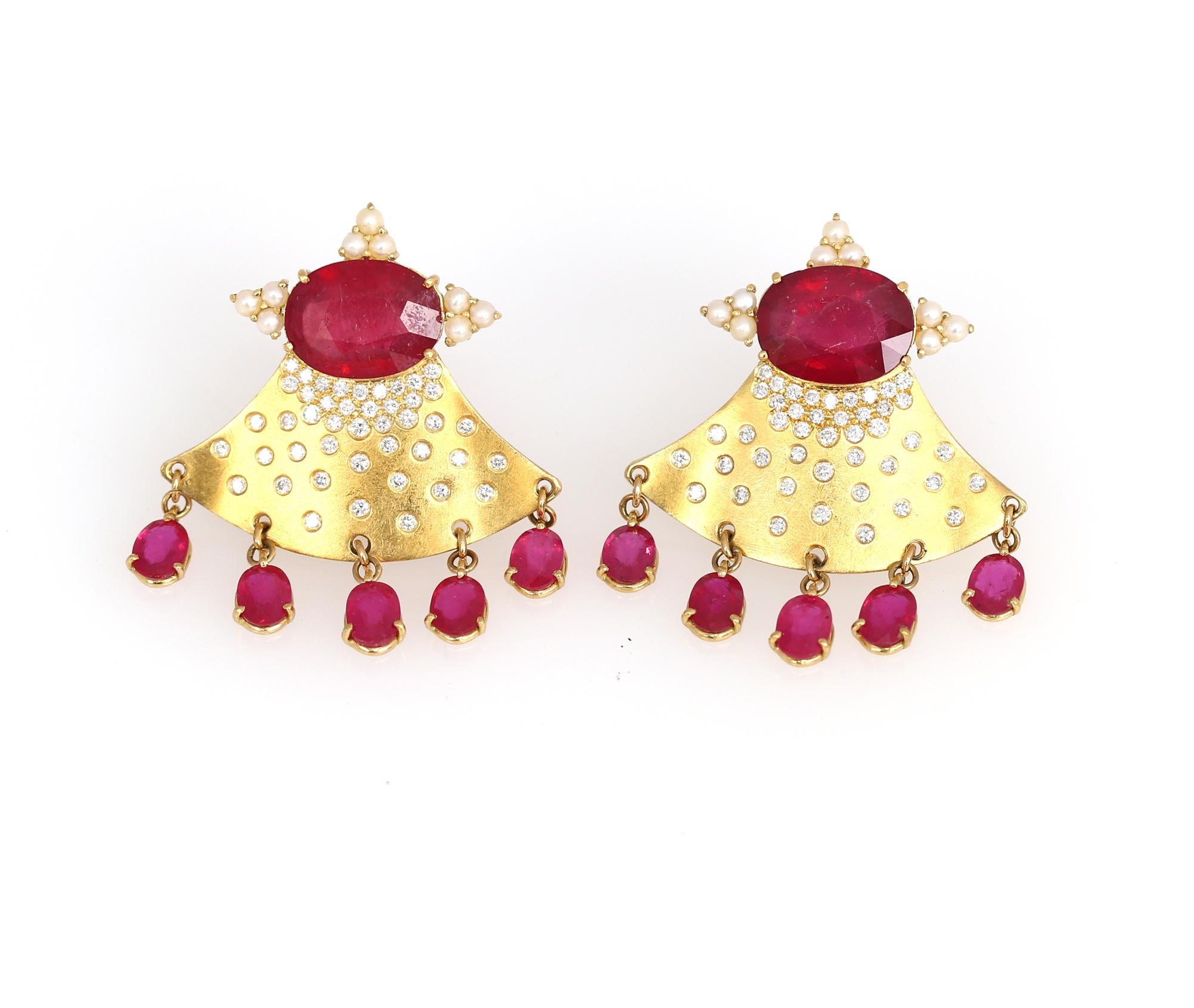 
Rubies Diamonds Pearls Gold Whimsical Earrings, 2000

Rubies Diamonds Pearl Earrings beads on Gold cast of Whimsical design. Deep red color oval Rubies surrounded by triangular shapes with Pearls. Going down from the Rubies as if a skirt of a