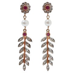 Boucles d'oreilles en or rose, diamants, perles et rubis.