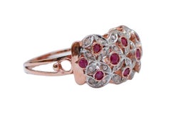 Anillo de Rubíes, Diamantes, Oro Rosa y Plata.