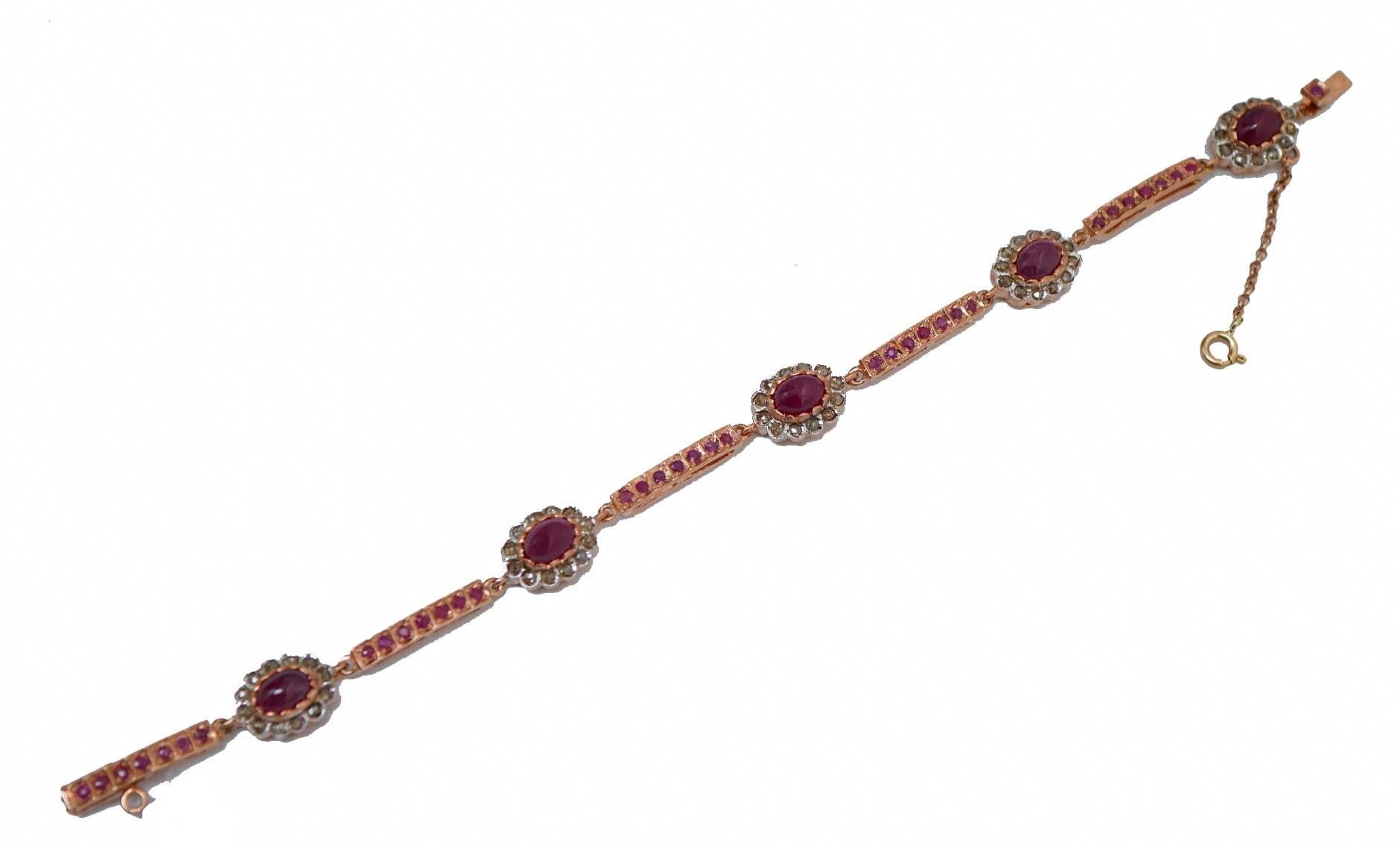 Amazing bracelet in 9 kt rose gold and silver structure mounted with five sections of rubies and, between of them, structures with a central ruby surrounded by diamonds.
This bracelet was totally handmade by Italian master goldsmiths and it is in