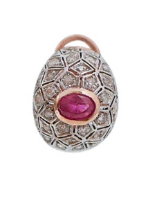Boucles d'oreilles en or rose, rubis et diamants.