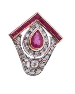 Boucles d'oreilles en or rose, rubis et diamants.