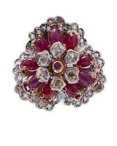 Pendientes de rubíes, diamantes, oro rosa y plata.