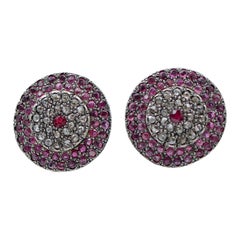 Pendientes de rubíes, diamantes, oro rosa y plata